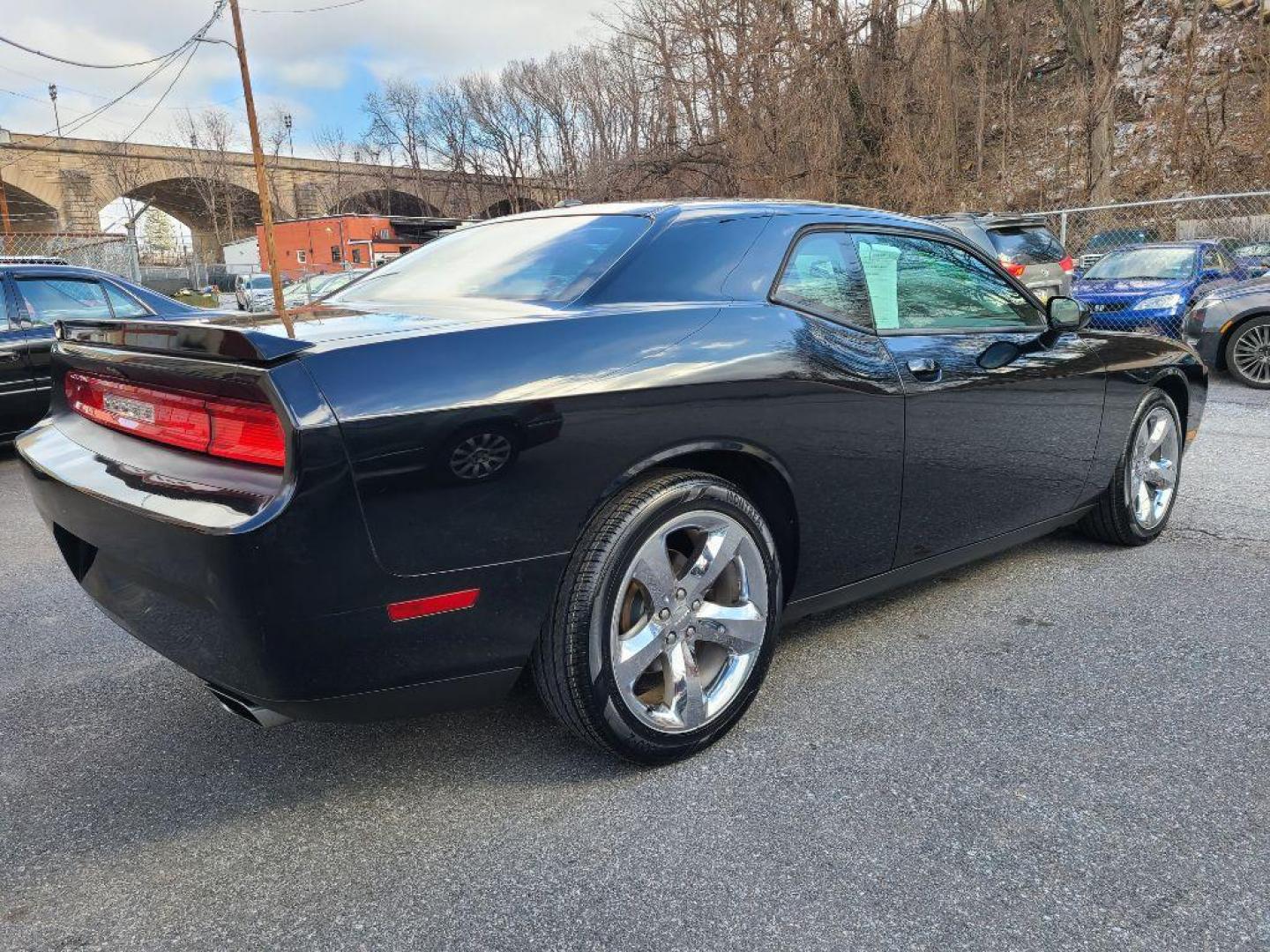 2012 BLACK DODGE CHALLENGER SXT Plus (2C3CDYAG9CH) with an 3.6L engine, Automatic transmission, located at 117 North Cameron Street, Harrisburg, PA, 17101, (717) 963-8962, 40.267021, -76.875351 - WE FINANCE!!! Good Credit/ Bad Credit/ No Credit - ALL Trade-Ins Welcomed!!! ***Guaranteed Credit Approval*** APPLY ONLINE or CALL us TODAY ;) Internet Prices and Marketplace Prices are SPECIAL discounted ***CASH DEALS*** Retail Prices are higher. Please call us to discuss your cash and finan - Photo#5