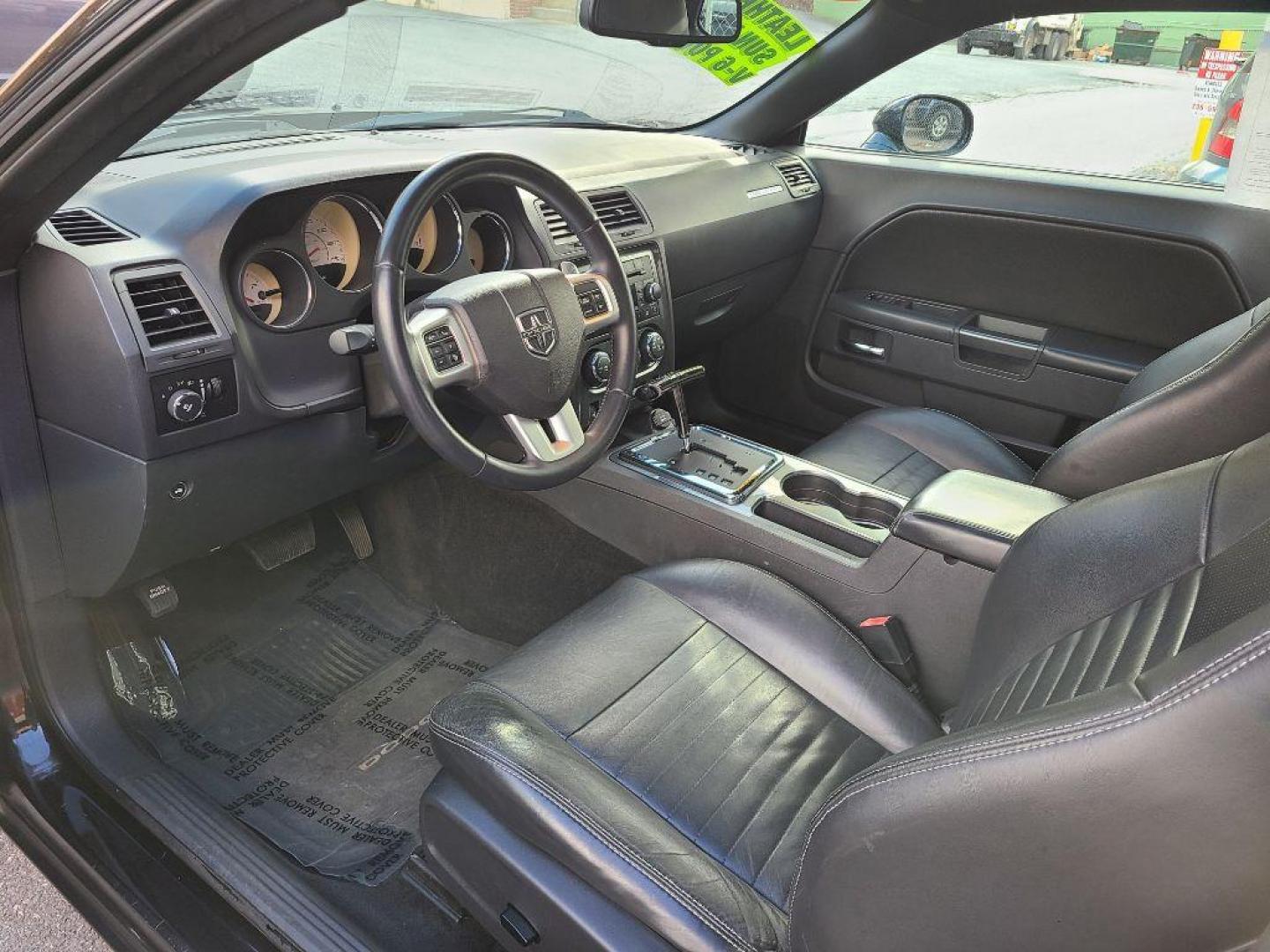 2012 BLACK DODGE CHALLENGER SXT Plus (2C3CDYAG9CH) with an 3.6L engine, Automatic transmission, located at 117 North Cameron Street, Harrisburg, PA, 17101, (717) 963-8962, 40.267021, -76.875351 - WE FINANCE!!! Good Credit/ Bad Credit/ No Credit - ALL Trade-Ins Welcomed!!! ***Guaranteed Credit Approval*** APPLY ONLINE or CALL us TODAY ;) Internet Prices and Marketplace Prices are SPECIAL discounted ***CASH DEALS*** Retail Prices are higher. Please call us to discuss your cash and finan - Photo#8