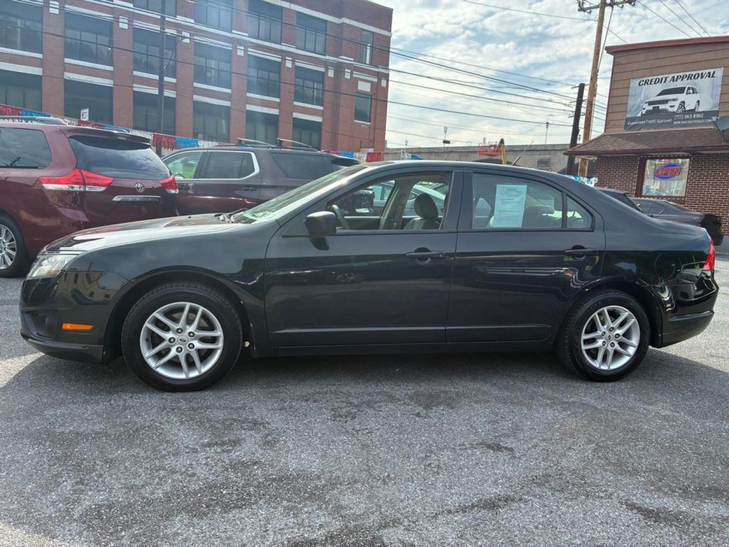 2012 BLACK FORD FUSION S (3FAHP0GA1CR) with an 2.5L engine, Automatic transmission, located at 117 North Cameron Street, Harrisburg, PA, 17101, (717) 963-8962, 40.267021, -76.875351- Photo#1