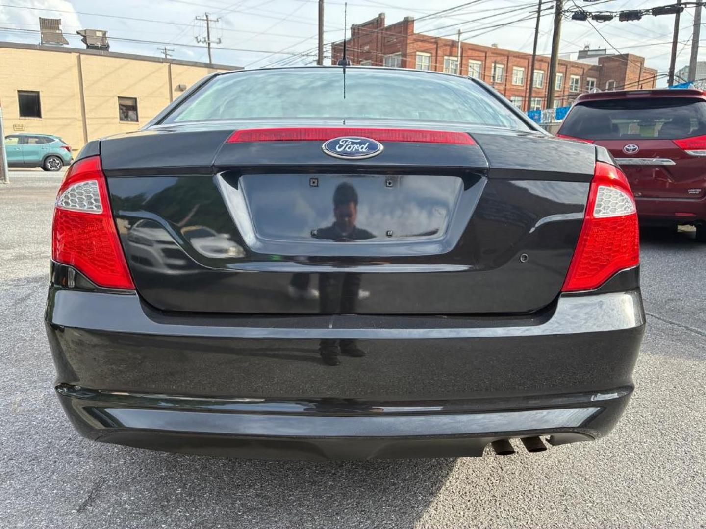 2012 BLACK FORD FUSION S (3FAHP0GA1CR) with an 2.5L engine, Automatic transmission, located at 117 North Cameron Street, Harrisburg, PA, 17101, (717) 963-8962, 40.267021, -76.875351- Photo#3