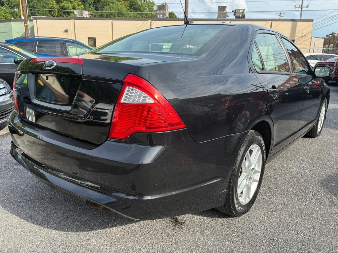 2012 BLACK FORD FUSION S (3FAHP0GA1CR) with an 2.5L engine, Automatic transmission, located at 117 North Cameron Street, Harrisburg, PA, 17101, (717) 963-8962, 40.267021, -76.875351- Photo#4