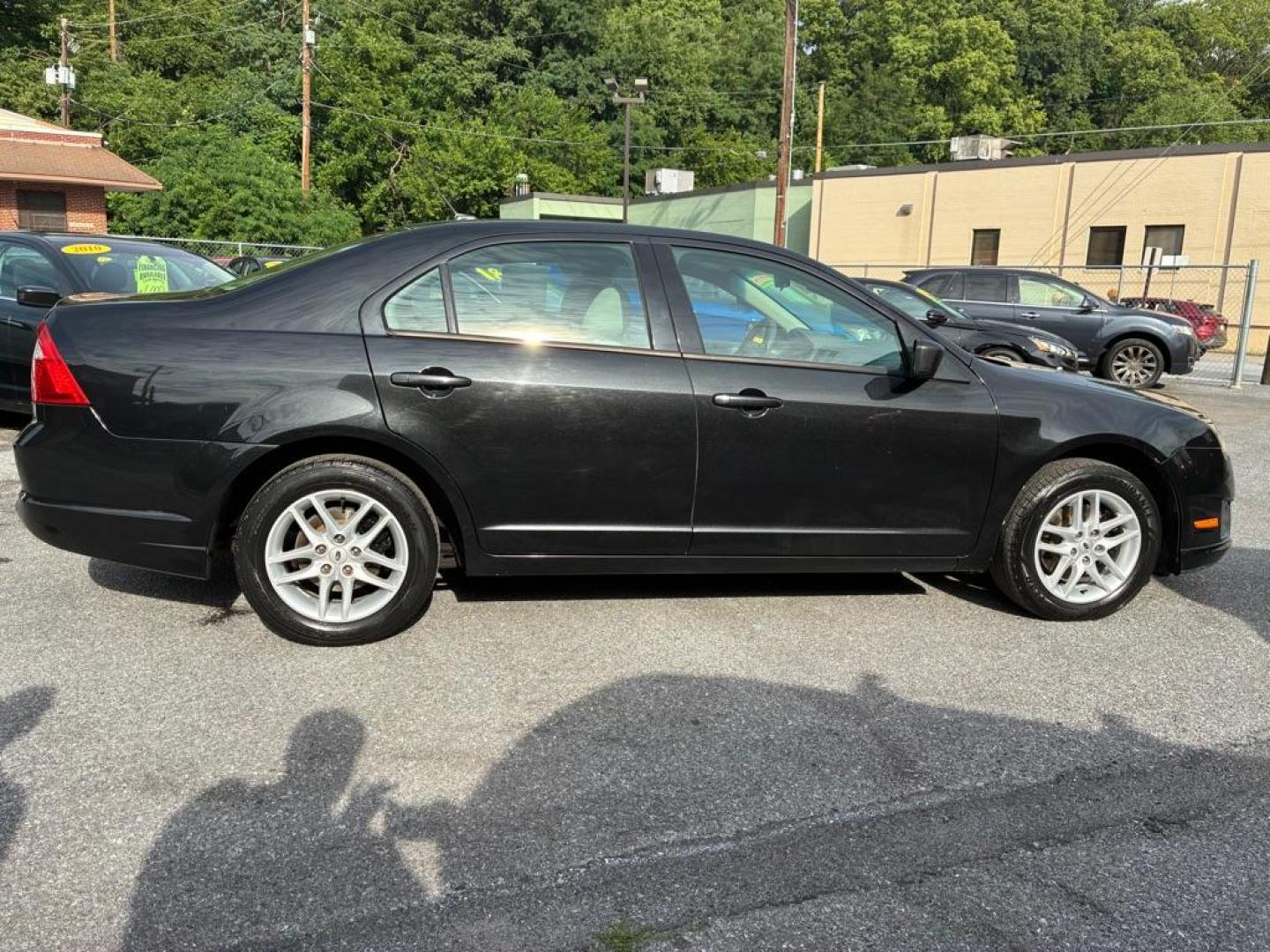 2012 BLACK FORD FUSION S (3FAHP0GA1CR) with an 2.5L engine, Automatic transmission, located at 117 North Cameron Street, Harrisburg, PA, 17101, (717) 963-8962, 40.267021, -76.875351- Photo#5