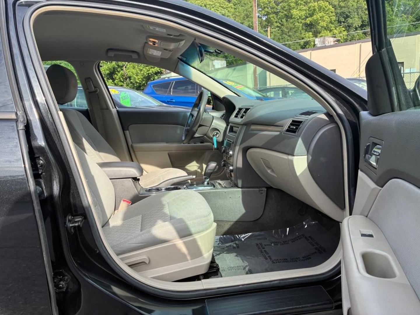 2012 BLACK FORD FUSION S (3FAHP0GA1CR) with an 2.5L engine, Automatic transmission, located at 117 North Cameron Street, Harrisburg, PA, 17101, (717) 963-8962, 40.267021, -76.875351- Photo#8