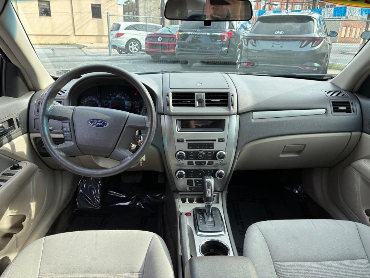 2012 BLACK FORD FUSION S (3FAHP0GA1CR) with an 2.5L engine, Automatic transmission, located at 117 North Cameron Street, Harrisburg, PA, 17101, (717) 963-8962, 40.267021, -76.875351- Photo#11