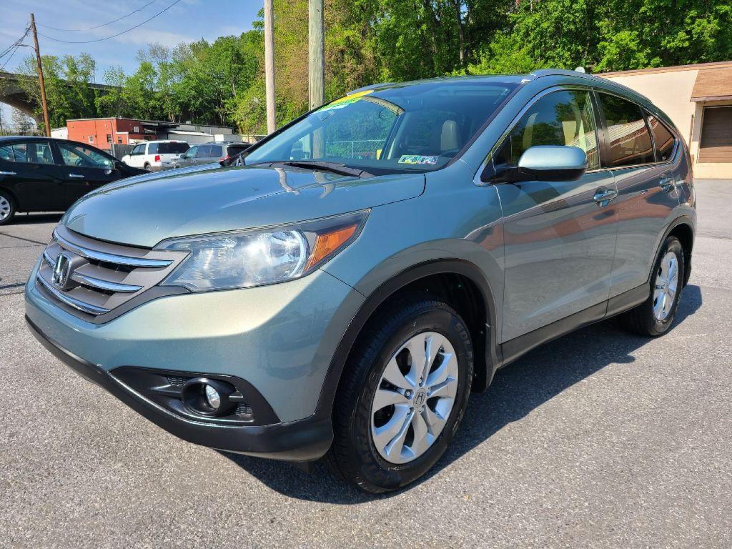 2012 GREEN HONDA CR-V EXL (JHLRM4H72CC) with an 2.4L engine, Automatic transmission, located at 117 North Cameron Street, Harrisburg, PA, 17101, (717) 963-8962, 40.267021, -76.875351 - WE FINANCE!!! Good Credit/ Bad Credit/ No Credit - ALL Trade-Ins Welcomed!!! ***Guaranteed Credit Approval*** APPLY ONLINE or CALL us TODAY ;) Internet Prices and Marketplace Prices are SPECIAL discounted ***CASH DEALS*** Retail Prices are higher. Please call us to discuss your cash and finan - Photo#0