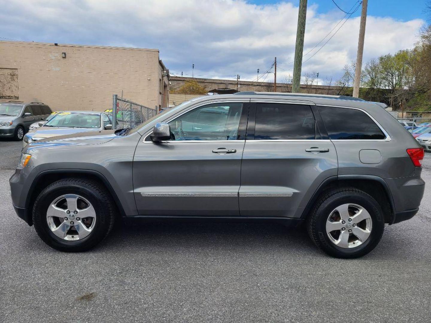 2012 GRAY JEEP GRAND CHEROKEE LAREDO (1C4RJFAG9CC) with an 3.6L engine, Automatic transmission, located at 117 North Cameron Street, Harrisburg, PA, 17101, (717) 963-8962, 40.267021, -76.875351 - Photo#1