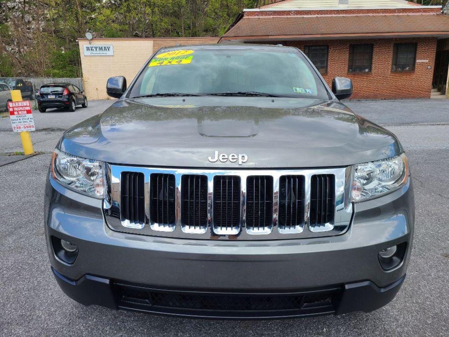 2012 GRAY JEEP GRAND CHEROKEE LAREDO (1C4RJFAG9CC) with an 3.6L engine, Automatic transmission, located at 117 North Cameron Street, Harrisburg, PA, 17101, (717) 963-8962, 40.267021, -76.875351 - Photo#7