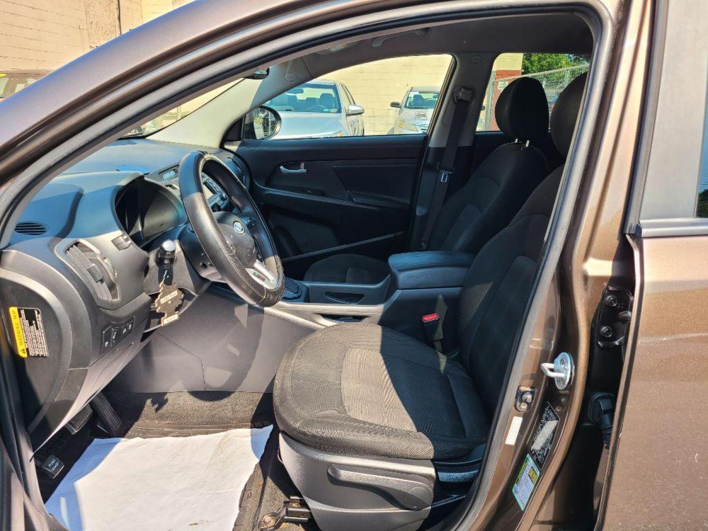 2012 BROWN KIA SPORTAGE LX (KNDPB3A26C7) with an 2.4L engine, Automatic transmission, located at 117 North Cameron Street, Harrisburg, PA, 17101, (717) 963-8962, 40.267021, -76.875351 - WE FINANCE!!! Good Credit/ Bad Credit/ No Credit - ALL Trade-Ins Welcomed!!! ***Guaranteed Credit Approval*** APPLY ONLINE or CALL us TODAY ;) Internet Prices and Marketplace Prices are SPECIAL discounted ***CASH DEALS*** Retail Prices are higher. Please call us to discuss your cash and finan - Photo#13