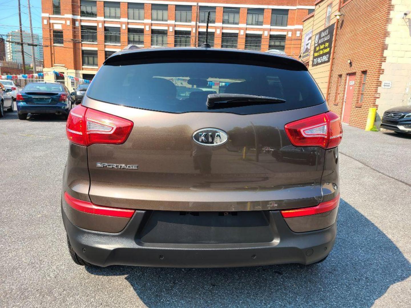2012 BROWN KIA SPORTAGE LX (KNDPB3A26C7) with an 2.4L engine, Automatic transmission, located at 117 North Cameron Street, Harrisburg, PA, 17101, (717) 963-8962, 40.267021, -76.875351 - WE FINANCE!!! Good Credit/ Bad Credit/ No Credit - ALL Trade-Ins Welcomed!!! ***Guaranteed Credit Approval*** APPLY ONLINE or CALL us TODAY ;) Internet Prices and Marketplace Prices are SPECIAL discounted ***CASH DEALS*** Retail Prices are higher. Please call us to discuss your cash and finan - Photo#3