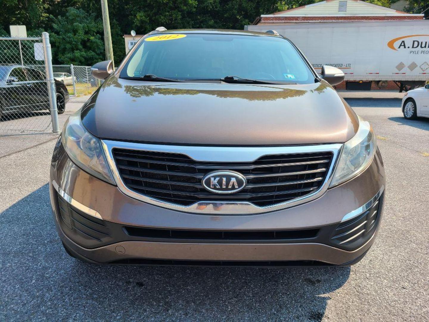 2012 BROWN KIA SPORTAGE LX (KNDPB3A26C7) with an 2.4L engine, Automatic transmission, located at 117 North Cameron Street, Harrisburg, PA, 17101, (717) 963-8962, 40.267021, -76.875351 - WE FINANCE!!! Good Credit/ Bad Credit/ No Credit - ALL Trade-Ins Welcomed!!! ***Guaranteed Credit Approval*** APPLY ONLINE or CALL us TODAY ;) Internet Prices and Marketplace Prices are SPECIAL discounted ***CASH DEALS*** Retail Prices are higher. Please call us to discuss your cash and finan - Photo#7