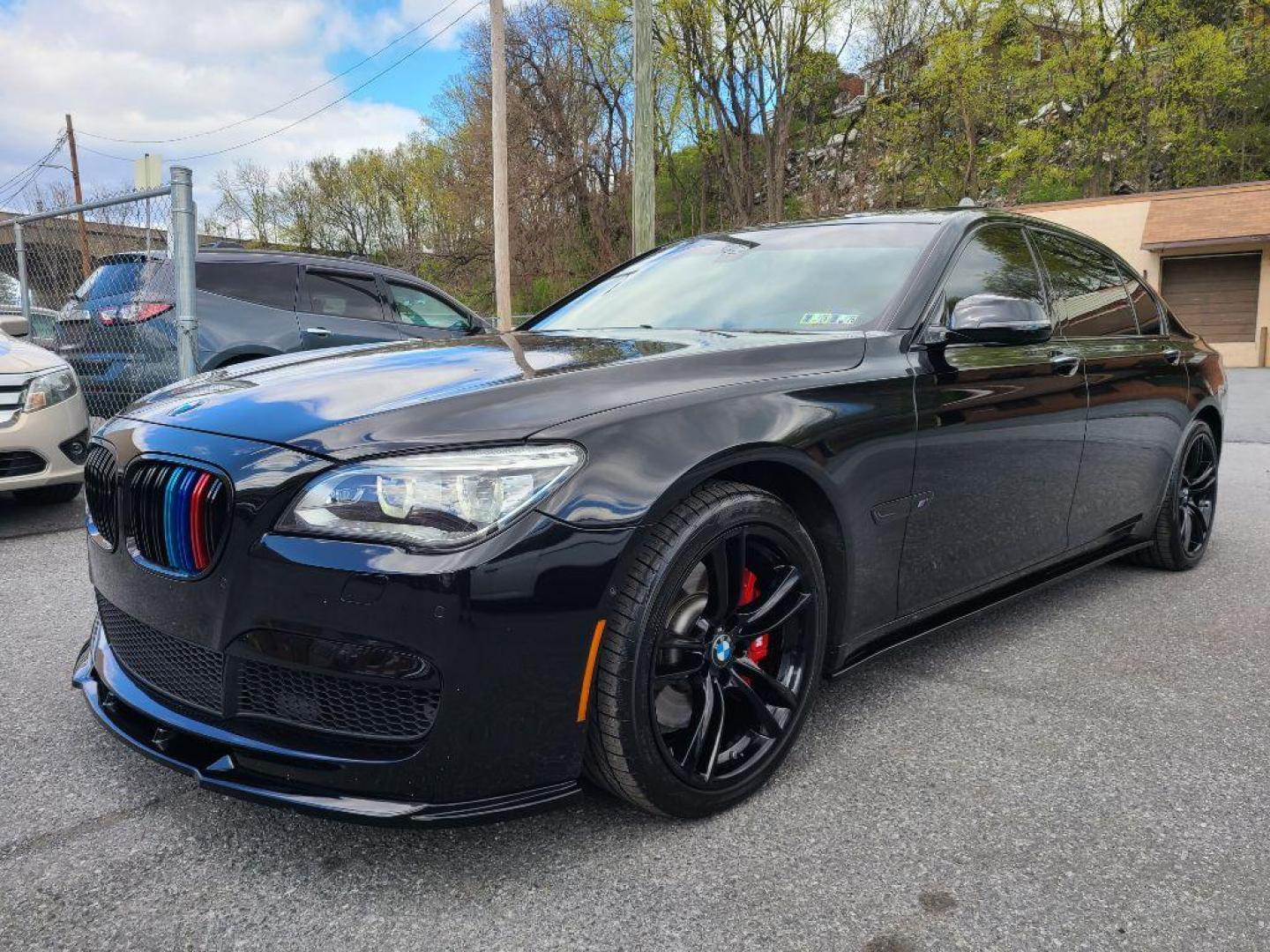 2013 BLACK BMW 750 LI (WBAYE8C50DD) with an 4.4L engine, Automatic transmission, located at 7981 Paxton Street, Harrisburg, PA, 17111, (717) 561-2926, 40.261490, -76.749229 - WE FINANCE!!! Good Credit/ Bad Credit/ No Credit - ALL Trade-Ins Welcomed!!! ***Guaranteed Credit Approval*** APPLY ONLINE or CALL us TODAY ;) Internet Prices and Marketplace Prices are SPECIAL discounted ***CASH DEALS*** Retail Prices are higher. Please call us to discuss your cash and finan - Photo#0