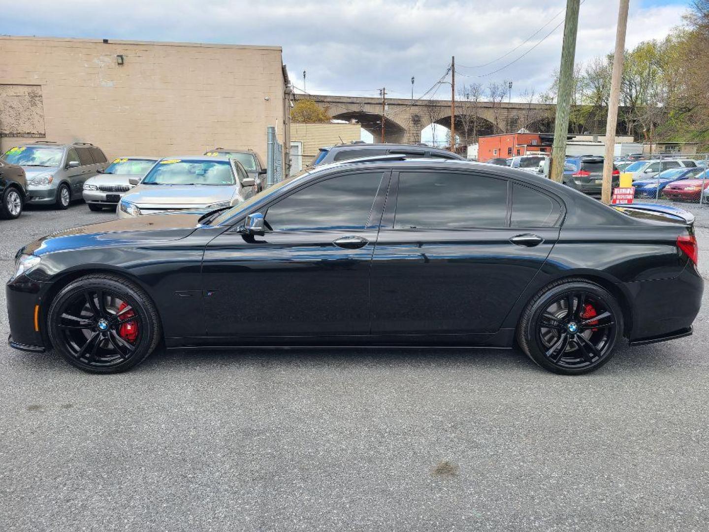 2013 BLACK BMW 750 LI (WBAYE8C50DD) with an 4.4L engine, Automatic transmission, located at 7981 Paxton Street, Harrisburg, PA, 17111, (717) 561-2926, 40.261490, -76.749229 - WE FINANCE!!! Good Credit/ Bad Credit/ No Credit - ALL Trade-Ins Welcomed!!! ***Guaranteed Credit Approval*** APPLY ONLINE or CALL us TODAY ;) Internet Prices and Marketplace Prices are SPECIAL discounted ***CASH DEALS*** Retail Prices are higher. Please call us to discuss your cash and finan - Photo#1