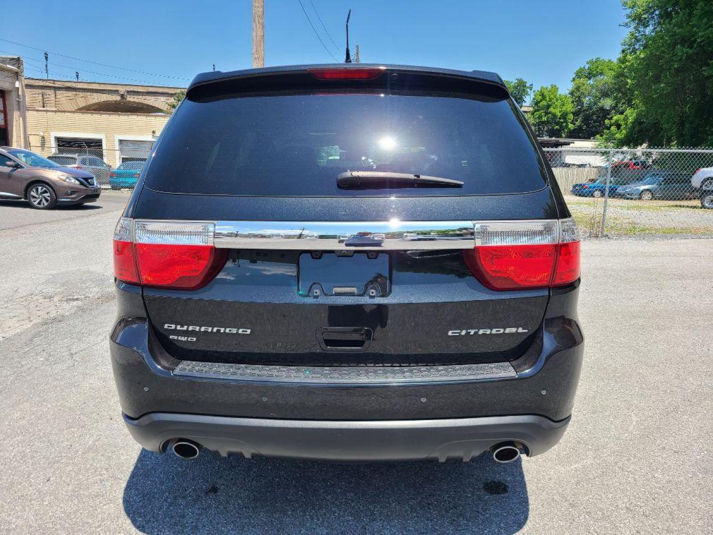 2013 BLACK DODGE DURANGO CITADEL (1C4SDJET6DC) with an 5.7L engine, Automatic transmission, located at 7981 Paxton Street, Harrisburg, PA, 17111, (717) 561-2926, 40.261490, -76.749229 - WE FINANCE!!! Good Credit/ Bad Credit/ No Credit - ALL Trade-Ins Welcomed!!! ***Guaranteed Credit Approval*** APPLY ONLINE or CALL us TODAY ;) Internet Prices and Marketplace Prices are SPECIAL discounted ***CASH DEALS*** Retail Prices are higher. Please call us to discuss your cash and finan - Photo#3