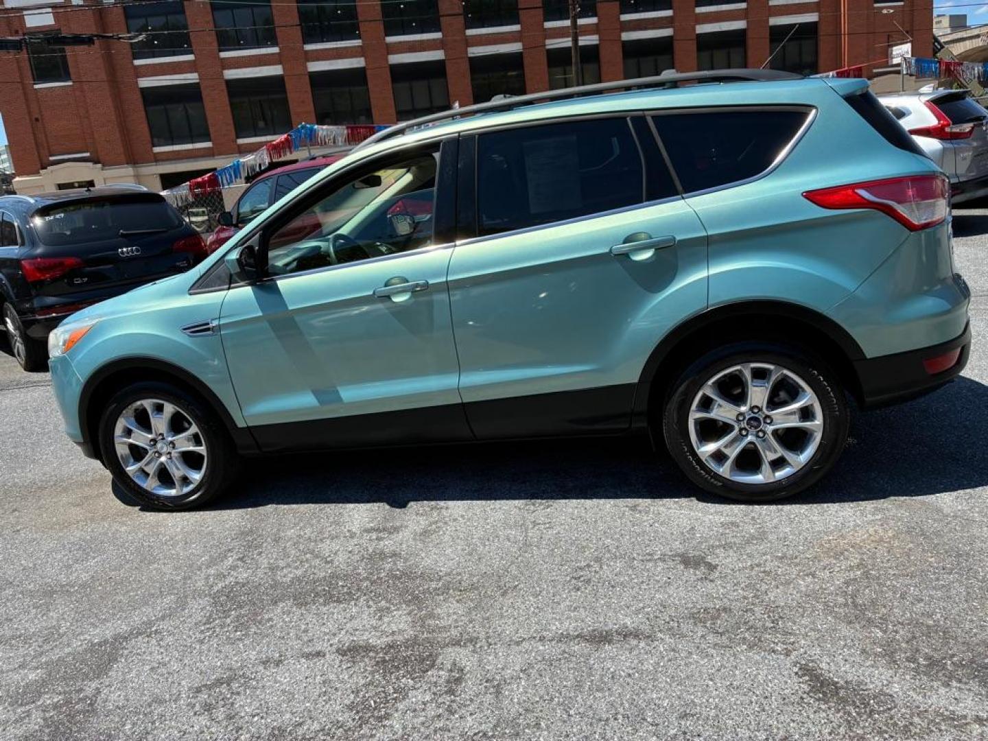 2013 GREEN FORD ESCAPE SE (1FMCU0GX1DU) with an 1.6L engine, Automatic transmission, located at 117 North Cameron Street, Harrisburg, PA, 17101, (717) 963-8962, 40.267021, -76.875351 - WE FINANCE!!! MOST vehicles are available for financing. Good Credit/ Challenged Credit/ No Credit - ALL Trade-Ins Welcomed!!! APPLY ONLINE or CALL us TODAY Please call us to discuss your cash and/or financing options. Thanks for checking our inventory! We're here to help. - Photo#1