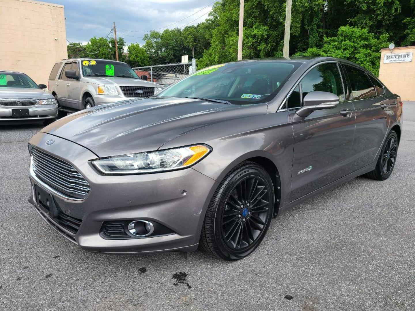2013 GRAY FORD FUSION SE HYBRID (3FA6P0LU8DR) with an 2.0L engine, Continuously Variable transmission, located at 117 North Cameron Street, Harrisburg, PA, 17101, (717) 963-8962, 40.267021, -76.875351 - WE FINANCE!!! Good Credit/ Bad Credit/ No Credit - ALL Trade-Ins Welcomed!!! ***Guaranteed Credit Approval*** APPLY ONLINE or CALL us TODAY ;) Internet Prices and Marketplace Prices are SPECIAL discounted ***CASH DEALS*** Retail Prices are higher. Please call us to discuss your cash and finan - Photo#0