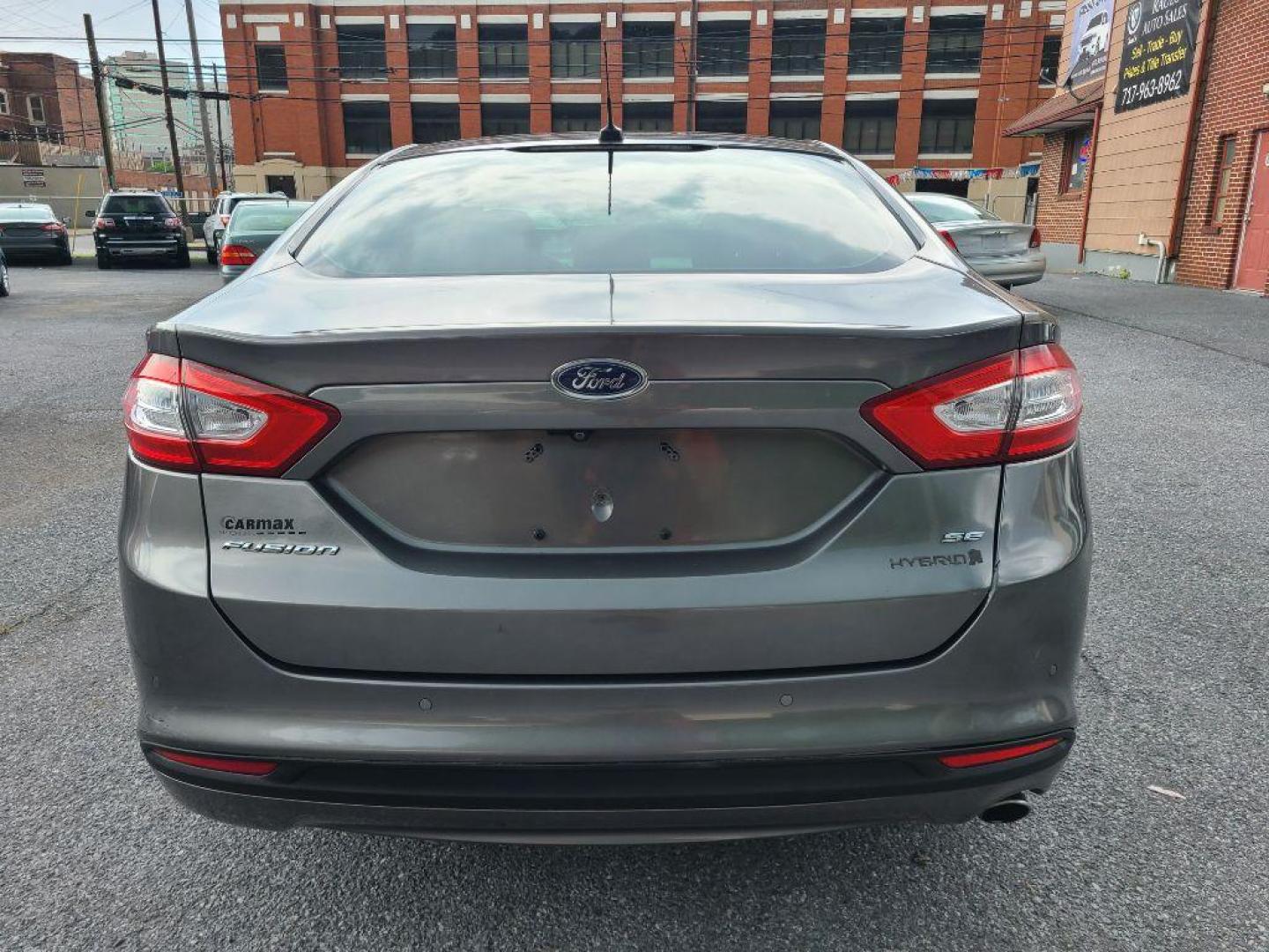 2013 GRAY FORD FUSION SE HYBRID (3FA6P0LU8DR) with an 2.0L engine, Continuously Variable transmission, located at 117 North Cameron Street, Harrisburg, PA, 17101, (717) 963-8962, 40.267021, -76.875351 - WE FINANCE!!! Good Credit/ Bad Credit/ No Credit - ALL Trade-Ins Welcomed!!! ***Guaranteed Credit Approval*** APPLY ONLINE or CALL us TODAY ;) Internet Prices and Marketplace Prices are SPECIAL discounted ***CASH DEALS*** Retail Prices are higher. Please call us to discuss your cash and finan - Photo#6