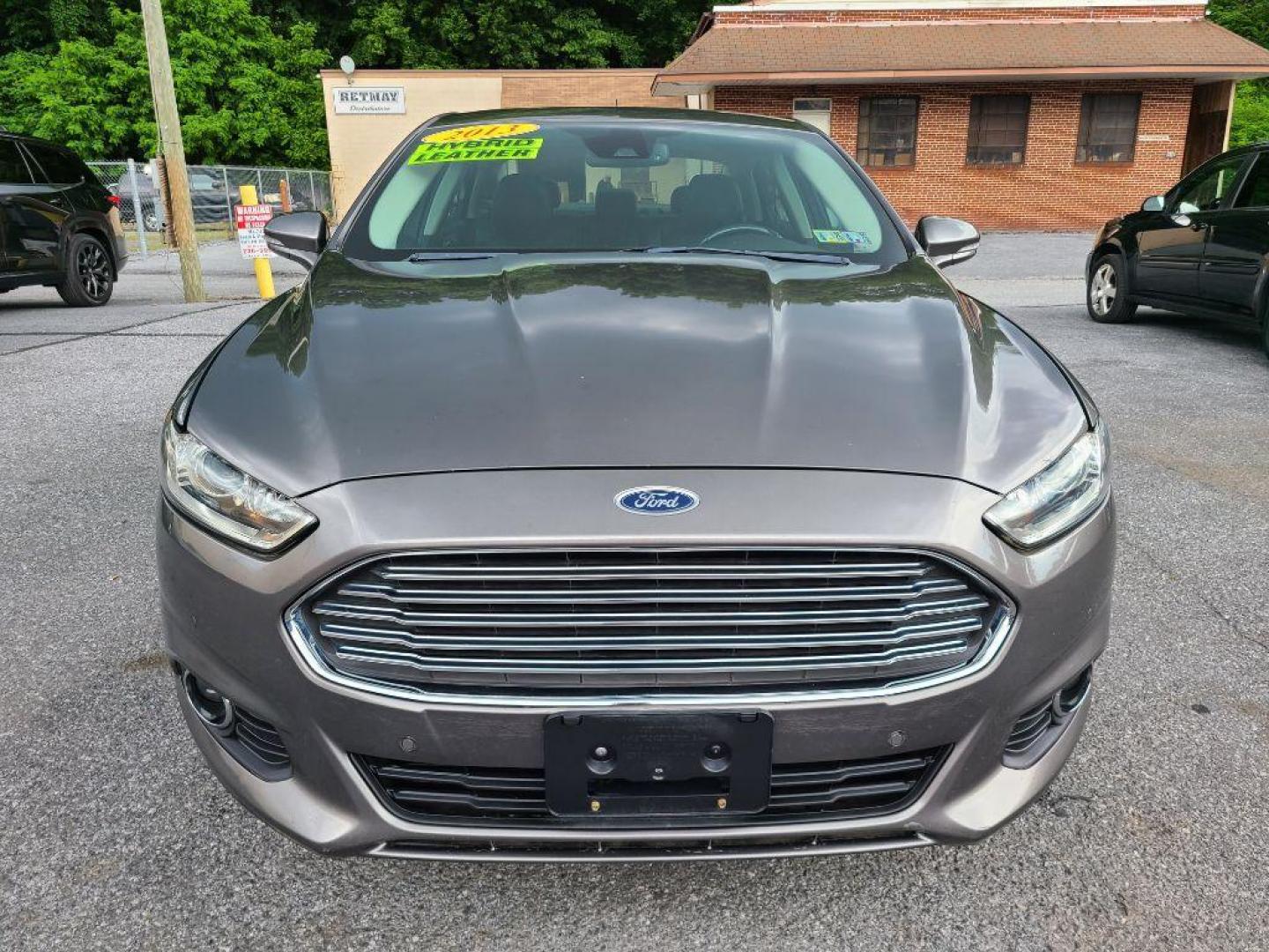 2013 GRAY FORD FUSION SE HYBRID (3FA6P0LU8DR) with an 2.0L engine, Continuously Variable transmission, located at 117 North Cameron Street, Harrisburg, PA, 17101, (717) 963-8962, 40.267021, -76.875351 - WE FINANCE!!! Good Credit/ Bad Credit/ No Credit - ALL Trade-Ins Welcomed!!! ***Guaranteed Credit Approval*** APPLY ONLINE or CALL us TODAY ;) Internet Prices and Marketplace Prices are SPECIAL discounted ***CASH DEALS*** Retail Prices are higher. Please call us to discuss your cash and finan - Photo#7