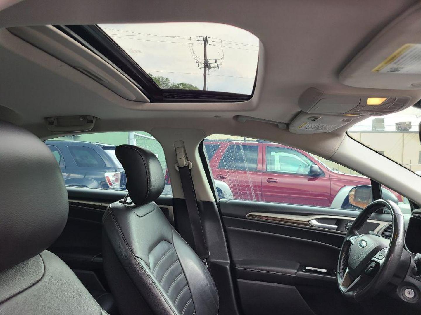 2013 GRAY FORD FUSION SE HYBRID (3FA6P0LU8DR) with an 2.0L engine, Continuously Variable transmission, located at 117 North Cameron Street, Harrisburg, PA, 17101, (717) 963-8962, 40.267021, -76.875351 - WE FINANCE!!! Good Credit/ Bad Credit/ No Credit - ALL Trade-Ins Welcomed!!! ***Guaranteed Credit Approval*** APPLY ONLINE or CALL us TODAY ;) Internet Prices and Marketplace Prices are SPECIAL discounted ***CASH DEALS*** Retail Prices are higher. Please call us to discuss your cash and finan - Photo#10