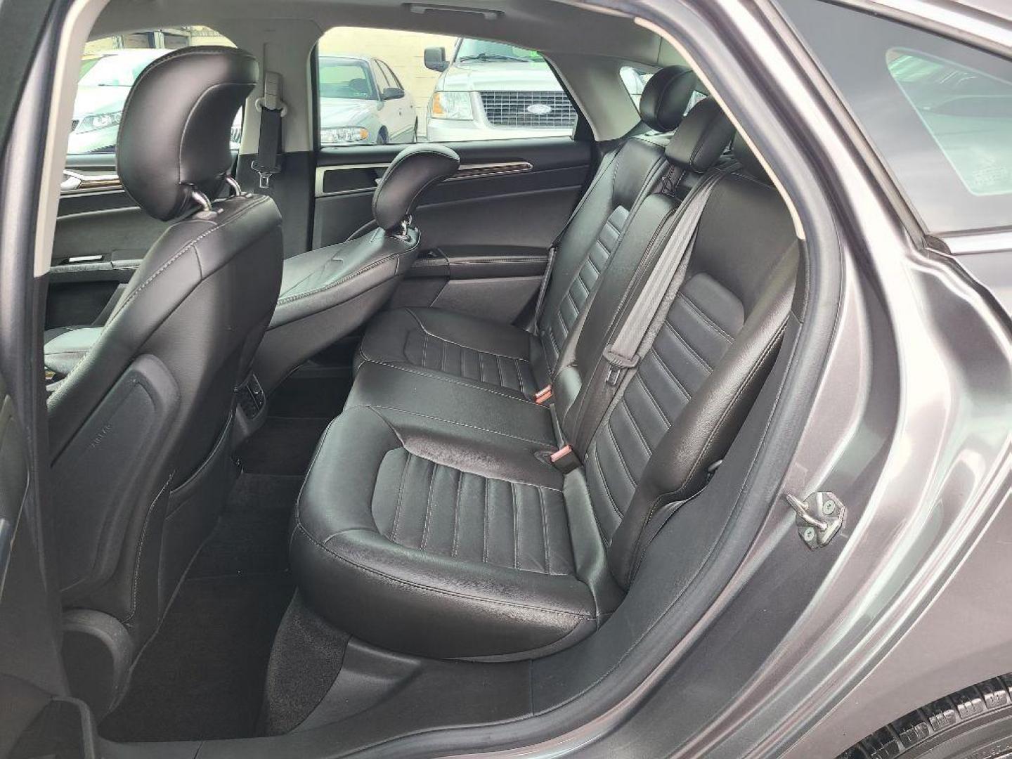 2013 GRAY FORD FUSION SE HYBRID (3FA6P0LU8DR) with an 2.0L engine, Continuously Variable transmission, located at 117 North Cameron Street, Harrisburg, PA, 17101, (717) 963-8962, 40.267021, -76.875351 - WE FINANCE!!! Good Credit/ Bad Credit/ No Credit - ALL Trade-Ins Welcomed!!! ***Guaranteed Credit Approval*** APPLY ONLINE or CALL us TODAY ;) Internet Prices and Marketplace Prices are SPECIAL discounted ***CASH DEALS*** Retail Prices are higher. Please call us to discuss your cash and finan - Photo#11