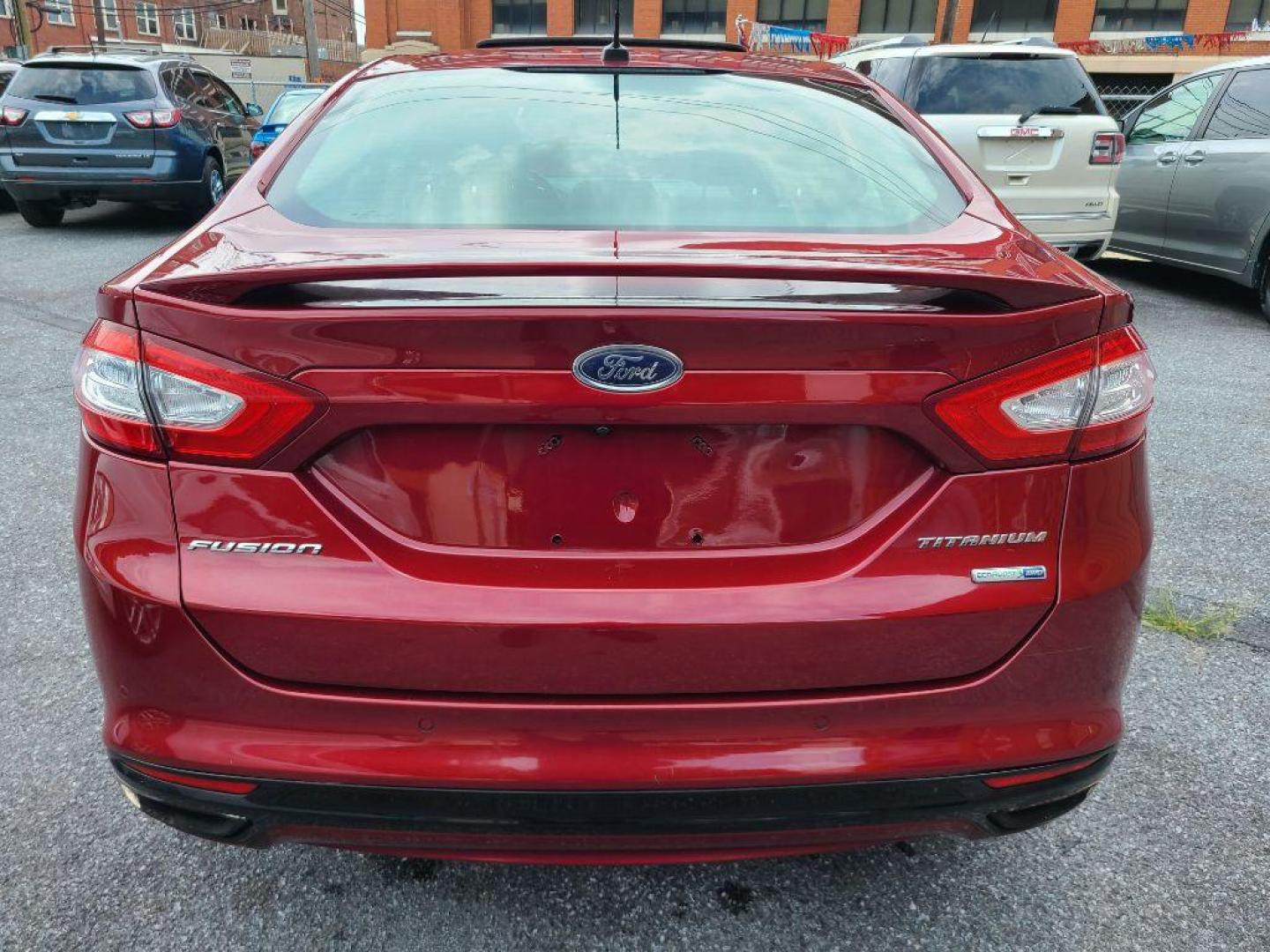 2013 RED FORD FUSION TITANIUM (3FA6P0D97DR) with an 2.0L engine, Automatic transmission, located at 117 North Cameron Street, Harrisburg, PA, 17101, (717) 963-8962, 40.267021, -76.875351 - WE FINANCE!!! Good Credit/ Bad Credit/ No Credit - ALL Trade-Ins Welcomed!!! ***Guaranteed Credit Approval*** APPLY ONLINE or CALL us TODAY ;) Internet Prices and Marketplace Prices are SPECIAL discounted ***CASH DEALS*** Retail Prices are higher. Please call us to discuss your cash and finan - Photo#1