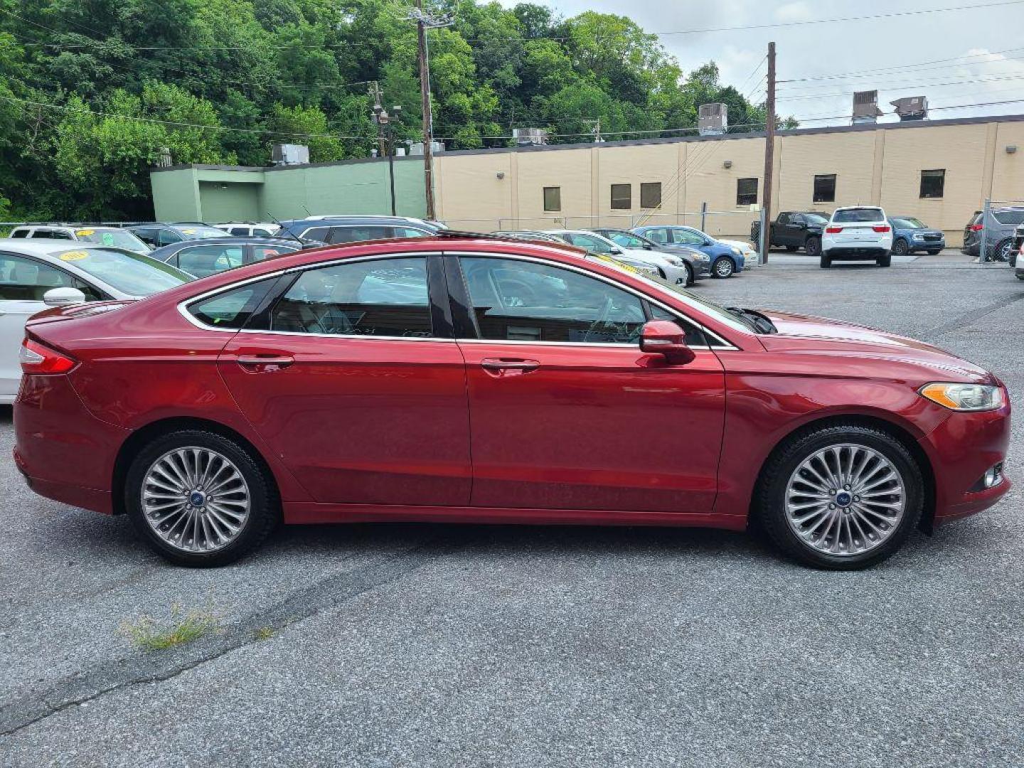 2013 RED FORD FUSION TITANIUM (3FA6P0D97DR) with an 2.0L engine, Automatic transmission, located at 117 North Cameron Street, Harrisburg, PA, 17101, (717) 963-8962, 40.267021, -76.875351 - WE FINANCE!!! Good Credit/ Bad Credit/ No Credit - ALL Trade-Ins Welcomed!!! ***Guaranteed Credit Approval*** APPLY ONLINE or CALL us TODAY ;) Internet Prices and Marketplace Prices are SPECIAL discounted ***CASH DEALS*** Retail Prices are higher. Please call us to discuss your cash and finan - Photo#2