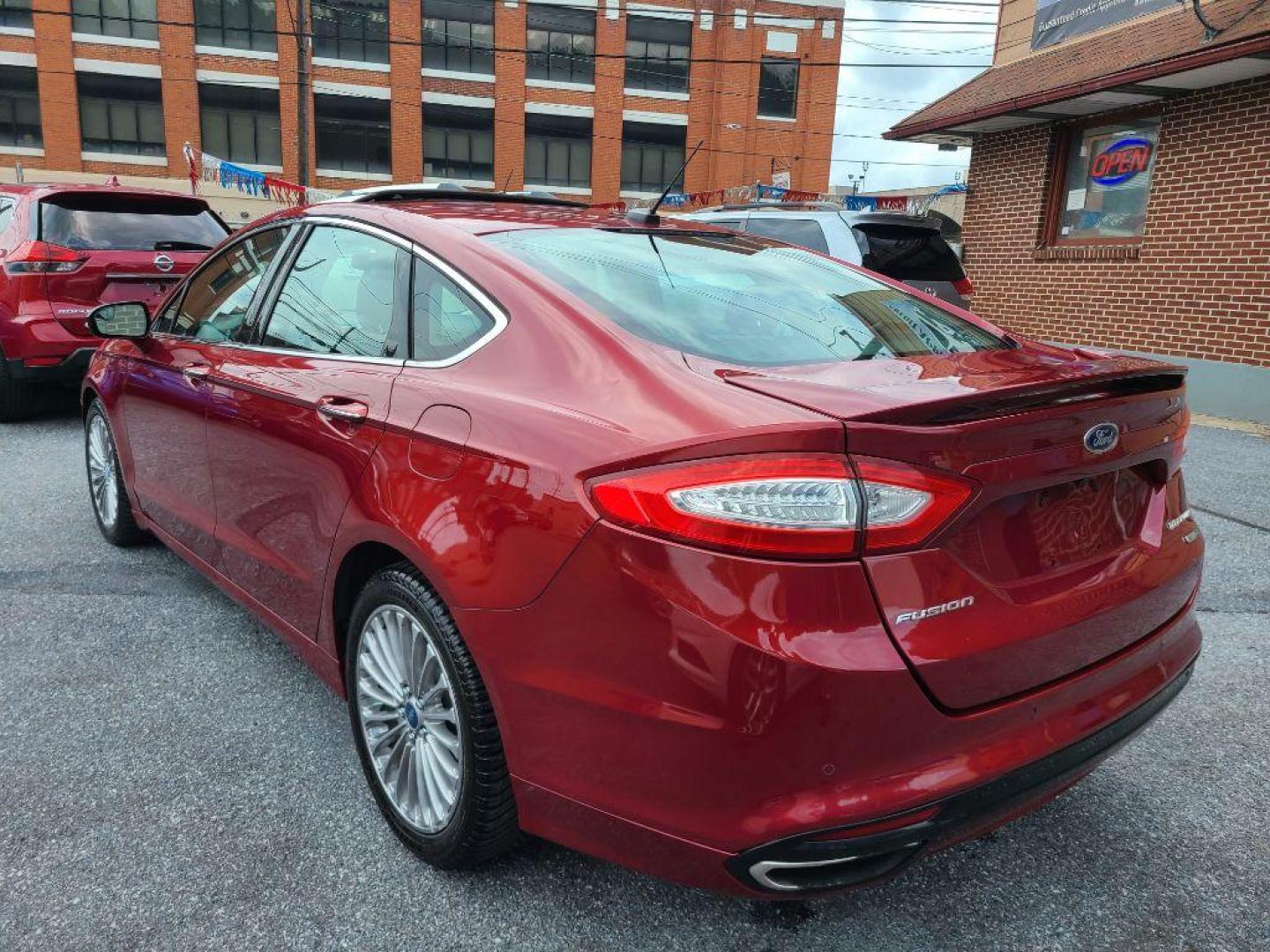 2013 RED FORD FUSION TITANIUM (3FA6P0D97DR) with an 2.0L engine, Automatic transmission, located at 117 North Cameron Street, Harrisburg, PA, 17101, (717) 963-8962, 40.267021, -76.875351 - WE FINANCE!!! Good Credit/ Bad Credit/ No Credit - ALL Trade-Ins Welcomed!!! ***Guaranteed Credit Approval*** APPLY ONLINE or CALL us TODAY ;) Internet Prices and Marketplace Prices are SPECIAL discounted ***CASH DEALS*** Retail Prices are higher. Please call us to discuss your cash and finan - Photo#3