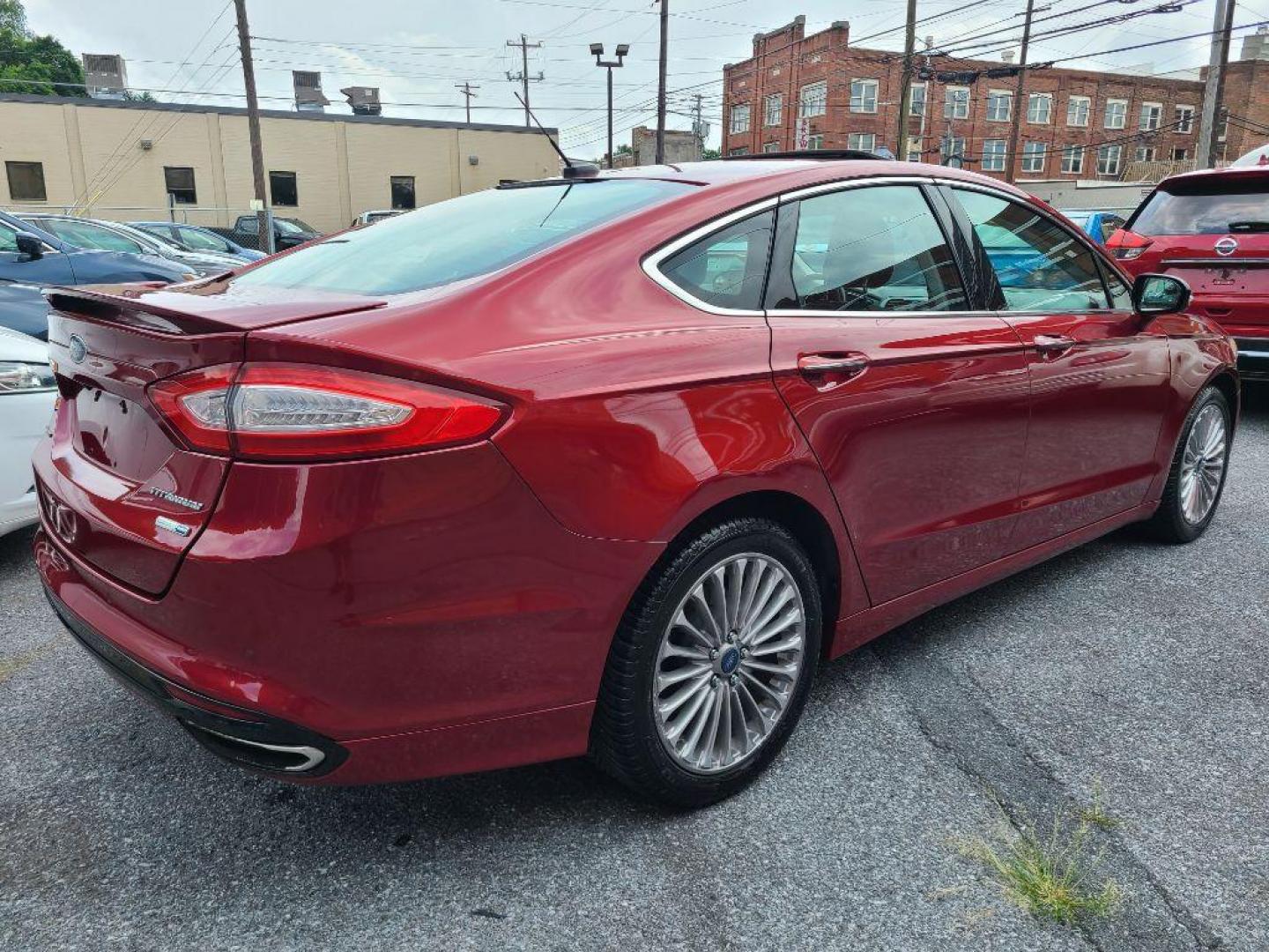 2013 RED FORD FUSION TITANIUM (3FA6P0D97DR) with an 2.0L engine, Automatic transmission, located at 117 North Cameron Street, Harrisburg, PA, 17101, (717) 963-8962, 40.267021, -76.875351 - WE FINANCE!!! Good Credit/ Bad Credit/ No Credit - ALL Trade-Ins Welcomed!!! ***Guaranteed Credit Approval*** APPLY ONLINE or CALL us TODAY ;) Internet Prices and Marketplace Prices are SPECIAL discounted ***CASH DEALS*** Retail Prices are higher. Please call us to discuss your cash and finan - Photo#6