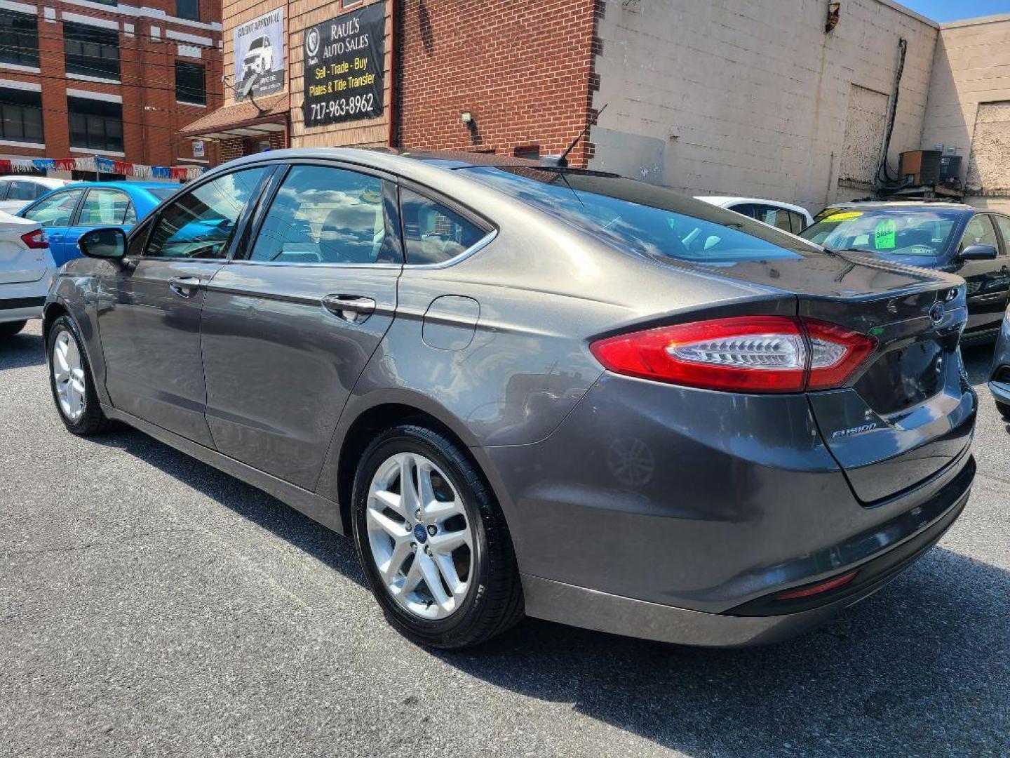 2013 GREY FORD FUSION SE (3FA6P0H76DR) with an 2.5L engine, Automatic transmission, located at 117 North Cameron Street, Harrisburg, PA, 17101, (717) 963-8962, 40.267021, -76.875351 - WE FINANCE!!! Good Credit/ Bad Credit/ No Credit - ALL Trade-Ins Welcomed!!! ***Guaranteed Credit Approval*** APPLY ONLINE or CALL us TODAY ;) Internet Prices and Marketplace Prices are SPECIAL discounted ***CASH DEALS*** Retail Prices are higher. Please call us to discuss your cash and finan - Photo#2