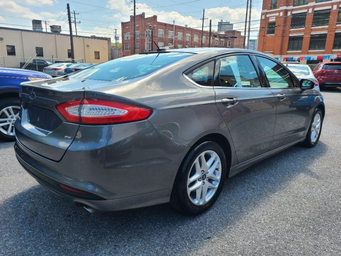 2013 GREY FORD FUSION SE (3FA6P0H76DR) with an 2.5L engine, Automatic transmission, located at 117 North Cameron Street, Harrisburg, PA, 17101, (717) 963-8962, 40.267021, -76.875351 - WE FINANCE!!! Good Credit/ Bad Credit/ No Credit - ALL Trade-Ins Welcomed!!! ***Guaranteed Credit Approval*** APPLY ONLINE or CALL us TODAY ;) Internet Prices and Marketplace Prices are SPECIAL discounted ***CASH DEALS*** Retail Prices are higher. Please call us to discuss your cash and finan - Photo#4