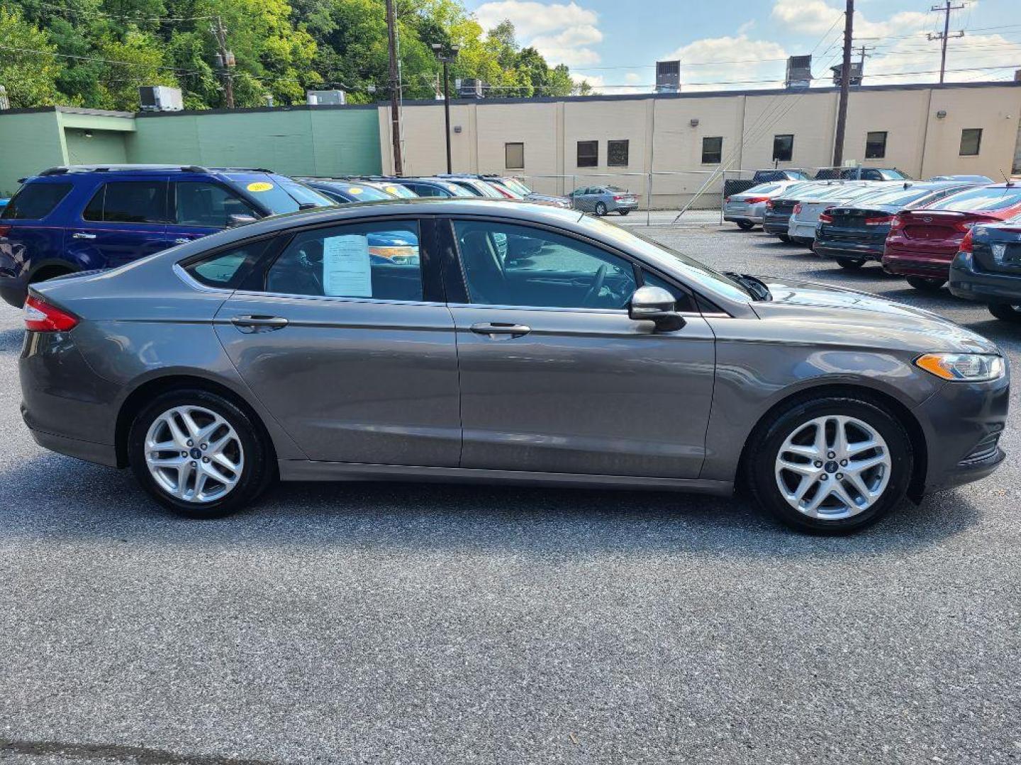 2013 GREY FORD FUSION SE (3FA6P0H76DR) with an 2.5L engine, Automatic transmission, located at 117 North Cameron Street, Harrisburg, PA, 17101, (717) 963-8962, 40.267021, -76.875351 - WE FINANCE!!! Good Credit/ Bad Credit/ No Credit - ALL Trade-Ins Welcomed!!! ***Guaranteed Credit Approval*** APPLY ONLINE or CALL us TODAY ;) Internet Prices and Marketplace Prices are SPECIAL discounted ***CASH DEALS*** Retail Prices are higher. Please call us to discuss your cash and finan - Photo#5