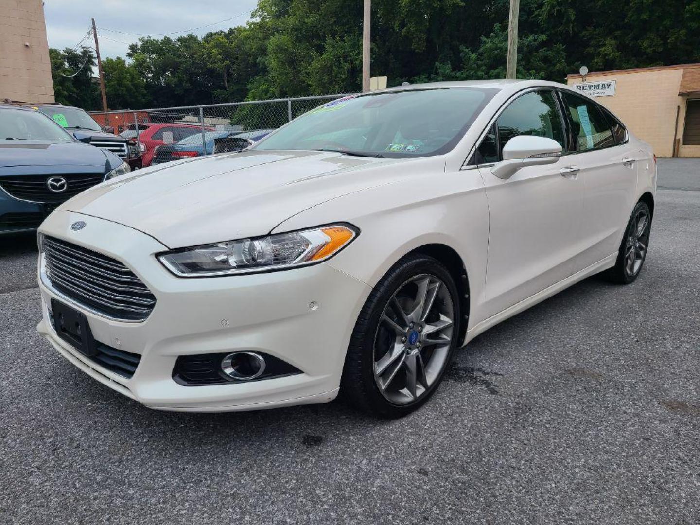 2013 WHITE FORD FUSION TITANIUM (3FA6P0K91DR) with an 2.0L engine, Automatic transmission, located at 117 North Cameron Street, Harrisburg, PA, 17101, (717) 963-8962, 40.267021, -76.875351 - WE FINANCE!!! Good Credit/ Bad Credit/ No Credit - ALL Trade-Ins Welcomed!!! ***Guaranteed Credit Approval*** APPLY ONLINE or CALL us TODAY ;) Internet Prices and Marketplace Prices are SPECIAL discounted ***CASH DEALS*** Retail Prices are higher. Please call us to discuss your cash and finan - Photo#0
