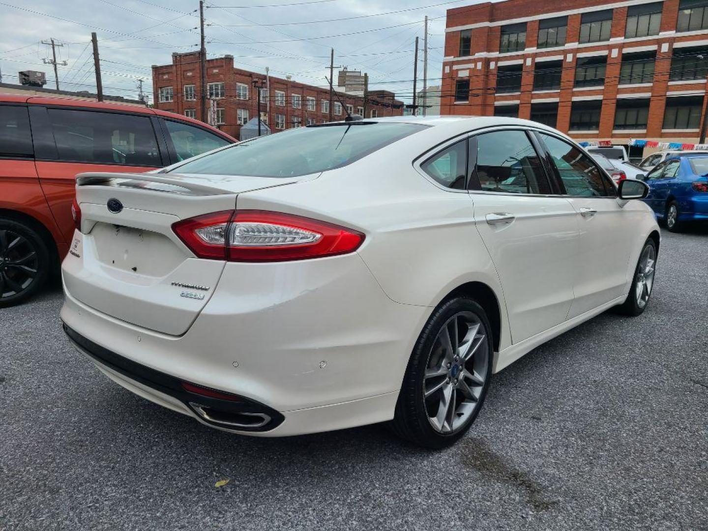 2013 WHITE FORD FUSION TITANIUM (3FA6P0K91DR) with an 2.0L engine, Automatic transmission, located at 117 North Cameron Street, Harrisburg, PA, 17101, (717) 963-8962, 40.267021, -76.875351 - WE FINANCE!!! Good Credit/ Bad Credit/ No Credit - ALL Trade-Ins Welcomed!!! ***Guaranteed Credit Approval*** APPLY ONLINE or CALL us TODAY ;) Internet Prices and Marketplace Prices are SPECIAL discounted ***CASH DEALS*** Retail Prices are higher. Please call us to discuss your cash and finan - Photo#4
