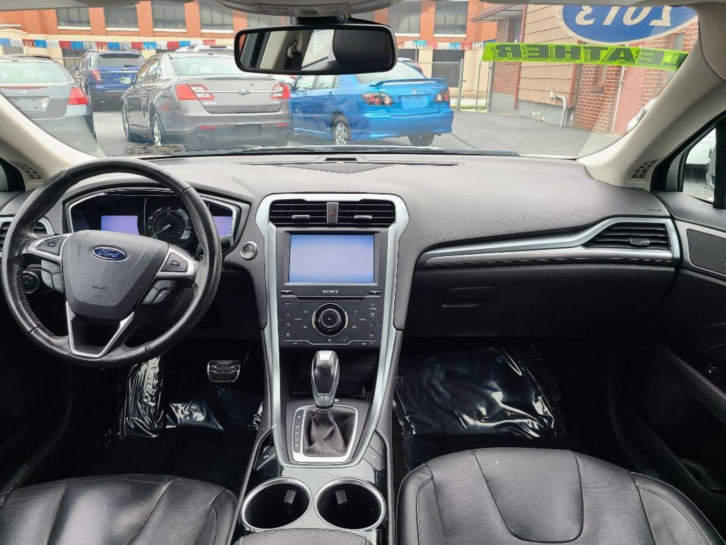 2013 WHITE FORD FUSION TITANIUM (3FA6P0K91DR) with an 2.0L engine, Automatic transmission, located at 117 North Cameron Street, Harrisburg, PA, 17101, (717) 963-8962, 40.267021, -76.875351 - WE FINANCE!!! Good Credit/ Bad Credit/ No Credit - ALL Trade-Ins Welcomed!!! ***Guaranteed Credit Approval*** APPLY ONLINE or CALL us TODAY ;) Internet Prices and Marketplace Prices are SPECIAL discounted ***CASH DEALS*** Retail Prices are higher. Please call us to discuss your cash and finan - Photo#11