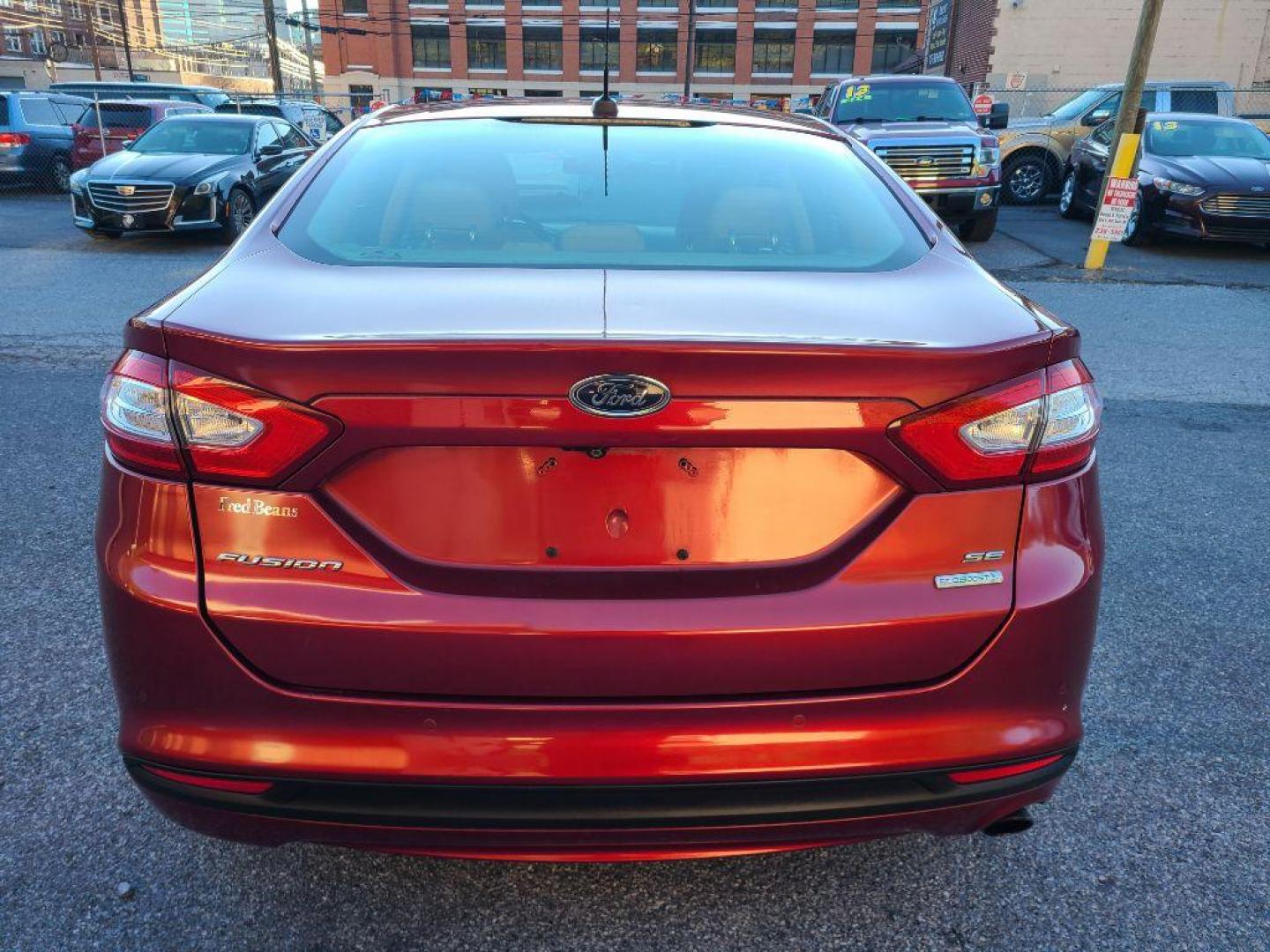 2013 RED FORD FUSION SE (3FA6P0HR0DR) with an 1.6L engine, Automatic transmission, located at 117 North Cameron Street, Harrisburg, PA, 17101, (717) 963-8962, 40.267021, -76.875351 - WE FINANCE!!! Good Credit/ Bad Credit/ No Credit - ALL Trade-Ins Welcomed!!! ***Guaranteed Credit Approval*** APPLY ONLINE or CALL us TODAY ;) Please call us to discuss your cash and financing options. - Photo#3