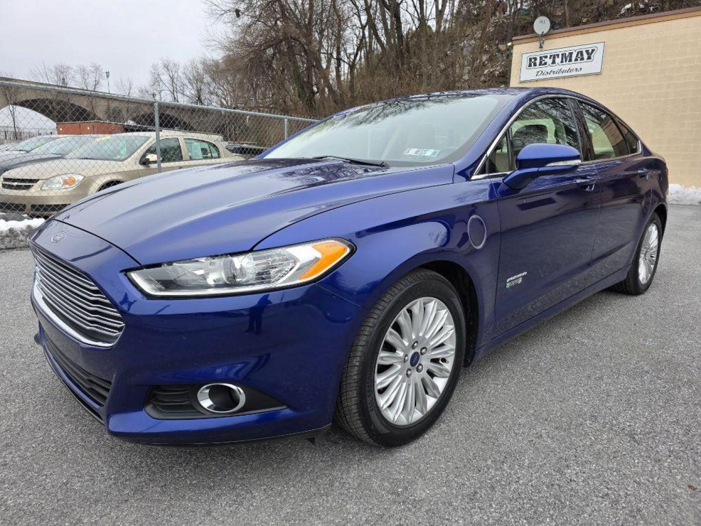 2013 BLUE FORD FUSION SE PHEV (3FA6P0PU7DR) with an 2.0L engine, Continuously Variable transmission, located at 117 North Cameron Street, Harrisburg, PA, 17101, (717) 963-8962, 40.267021, -76.875351 - WE FINANCE!!! Good Credit/ Bad Credit/ No Credit - ALL Trade-Ins Welcomed!!! ***Guaranteed Credit Approval*** APPLY ONLINE or CALL us TODAY ;) Please call us to discuss your cash and financing options. - Photo#0