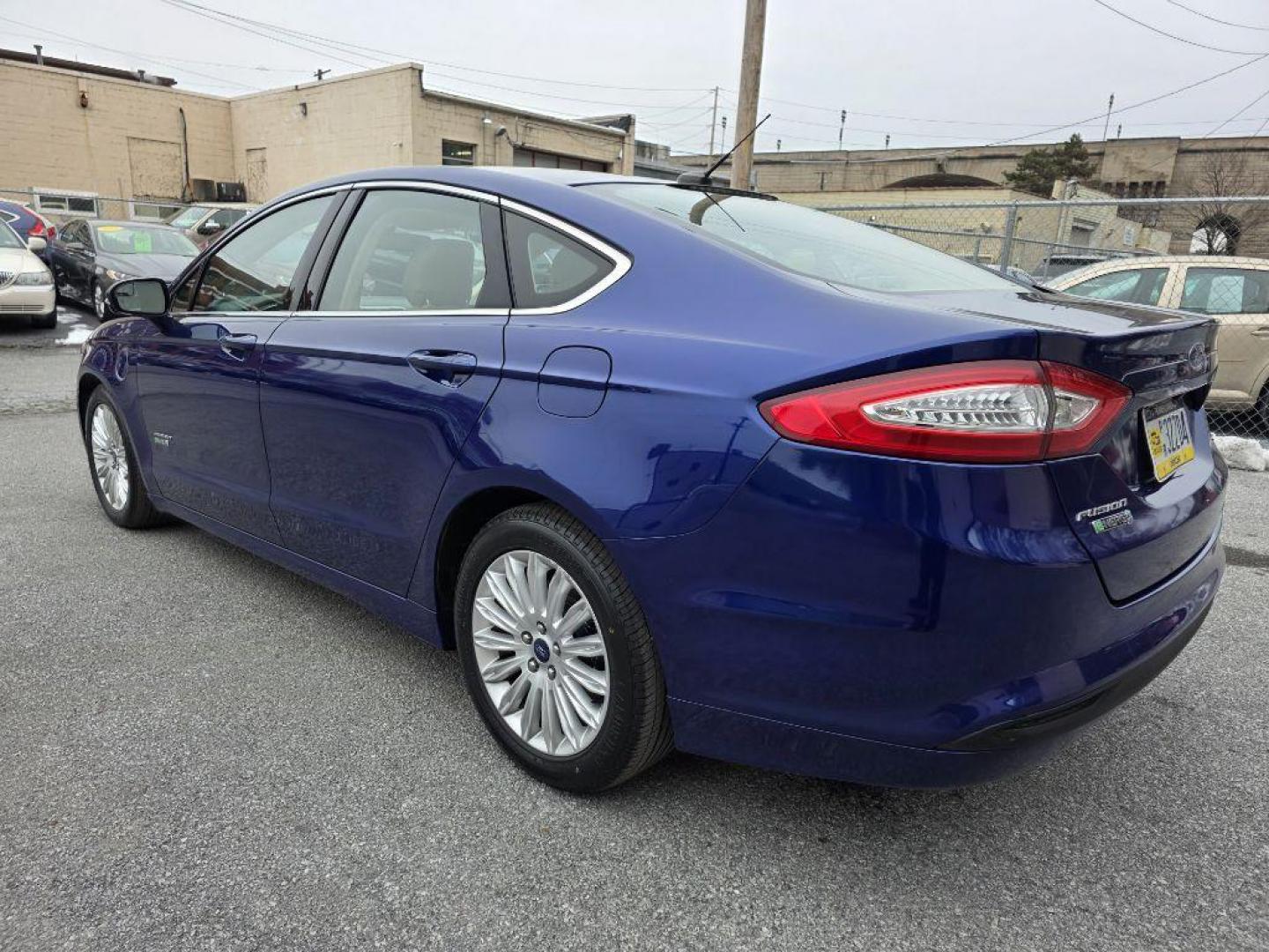 2013 BLUE FORD FUSION SE PHEV (3FA6P0PU7DR) with an 2.0L engine, Continuously Variable transmission, located at 117 North Cameron Street, Harrisburg, PA, 17101, (717) 963-8962, 40.267021, -76.875351 - WE FINANCE!!! Good Credit/ Bad Credit/ No Credit - ALL Trade-Ins Welcomed!!! ***Guaranteed Credit Approval*** APPLY ONLINE or CALL us TODAY ;) Please call us to discuss your cash and financing options. - Photo#2