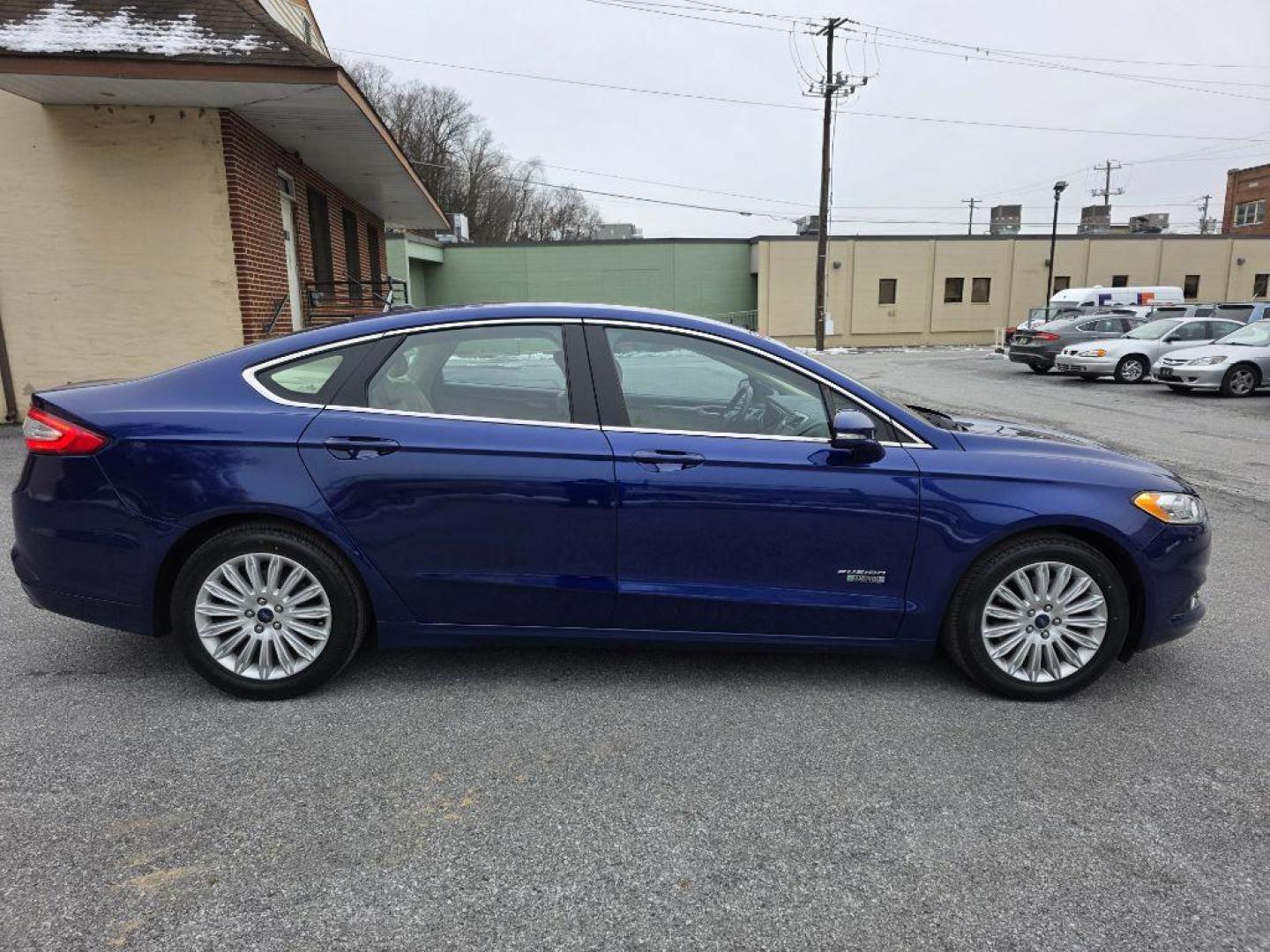 2013 BLUE FORD FUSION SE PHEV (3FA6P0PU7DR) with an 2.0L engine, Continuously Variable transmission, located at 117 North Cameron Street, Harrisburg, PA, 17101, (717) 963-8962, 40.267021, -76.875351 - WE FINANCE!!! Good Credit/ Bad Credit/ No Credit - ALL Trade-Ins Welcomed!!! ***Guaranteed Credit Approval*** APPLY ONLINE or CALL us TODAY ;) Please call us to discuss your cash and financing options. - Photo#5