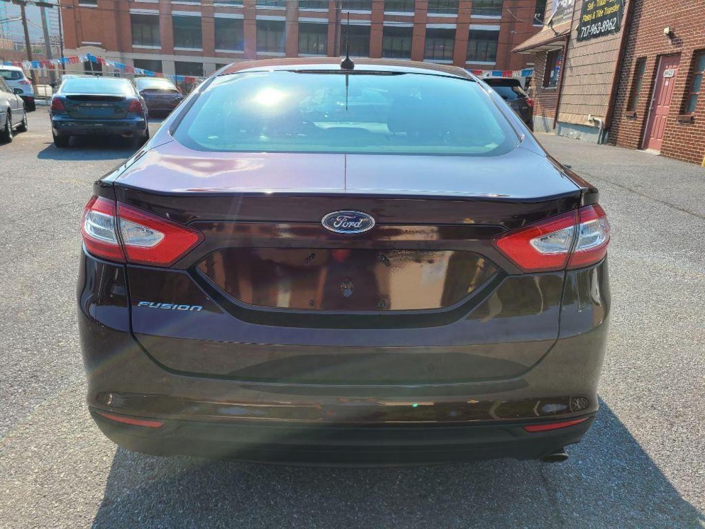 2013 MAROON FORD FUSION S (3FA6P0G76DR) with an 2.5L engine, Automatic transmission, located at 117 North Cameron Street, Harrisburg, PA, 17101, (717) 963-8962, 40.267021, -76.875351 - WE FINANCE!!! Good Credit/ Bad Credit/ No Credit - ALL Trade-Ins Welcomed!!! ***Guaranteed Credit Approval*** APPLY ONLINE or CALL us TODAY ;) Internet Prices and Marketplace Prices are SPECIAL discounted ***CASH DEALS*** Retail Prices are higher. Please call us to discuss your cash and finan - Photo#3
