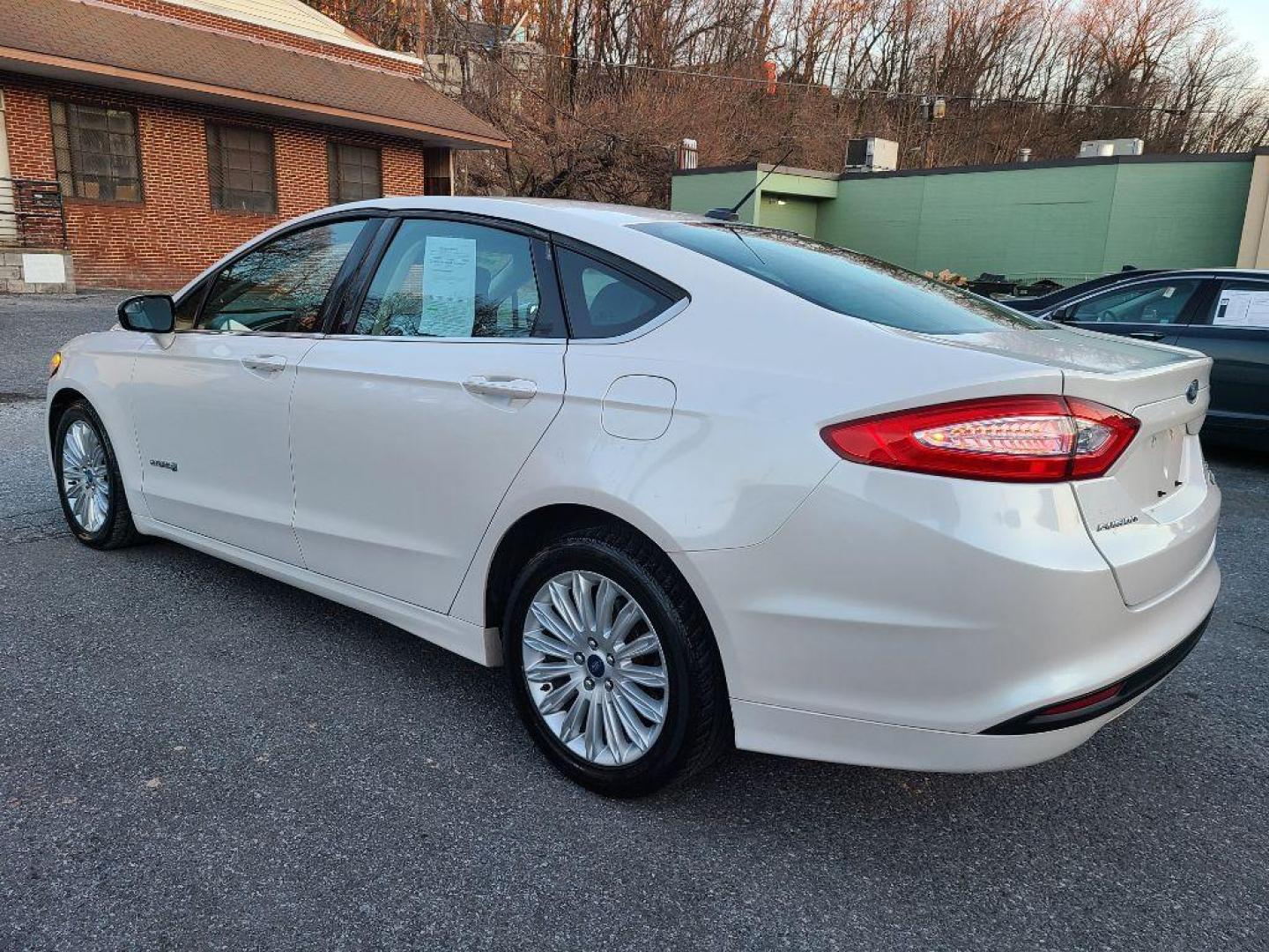 2013 WHITE FORD FUSION SE HYBRID (3FA6P0LUXDR) with an 2.0L engine, Continuously Variable transmission, located at 7981 Paxton Street, Harrisburg, PA, 17111, (717) 561-2926, 40.261490, -76.749229 - Photo#2