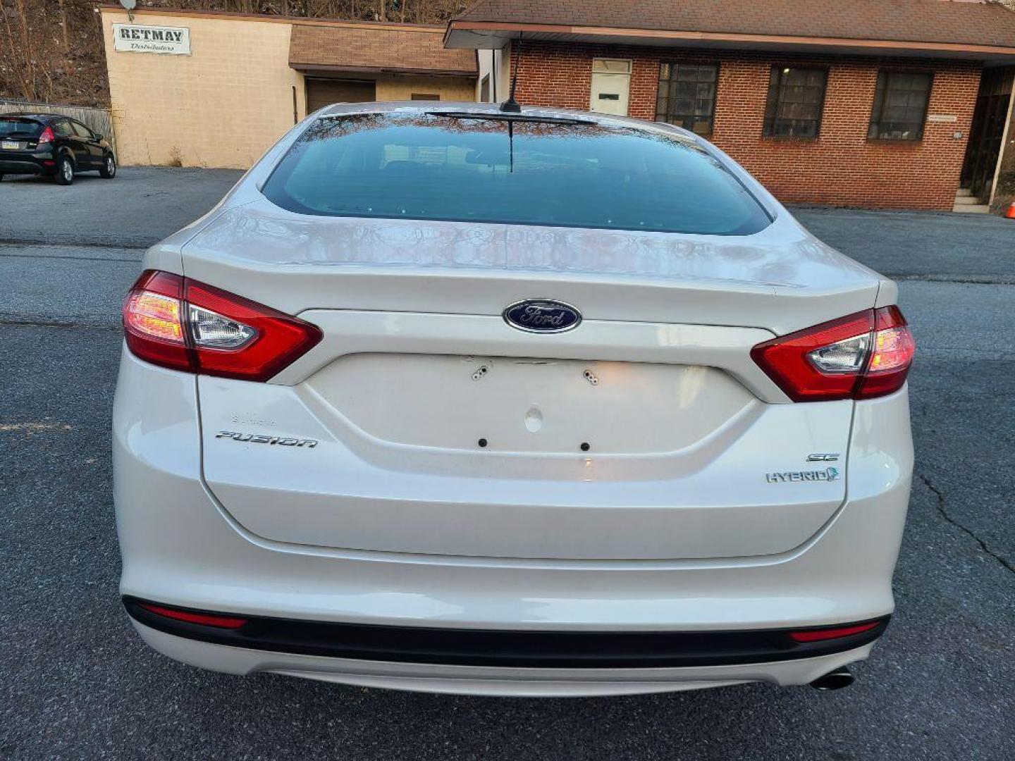 2013 WHITE FORD FUSION SE HYBRID (3FA6P0LUXDR) with an 2.0L engine, Continuously Variable transmission, located at 7981 Paxton Street, Harrisburg, PA, 17111, (717) 561-2926, 40.261490, -76.749229 - Photo#3