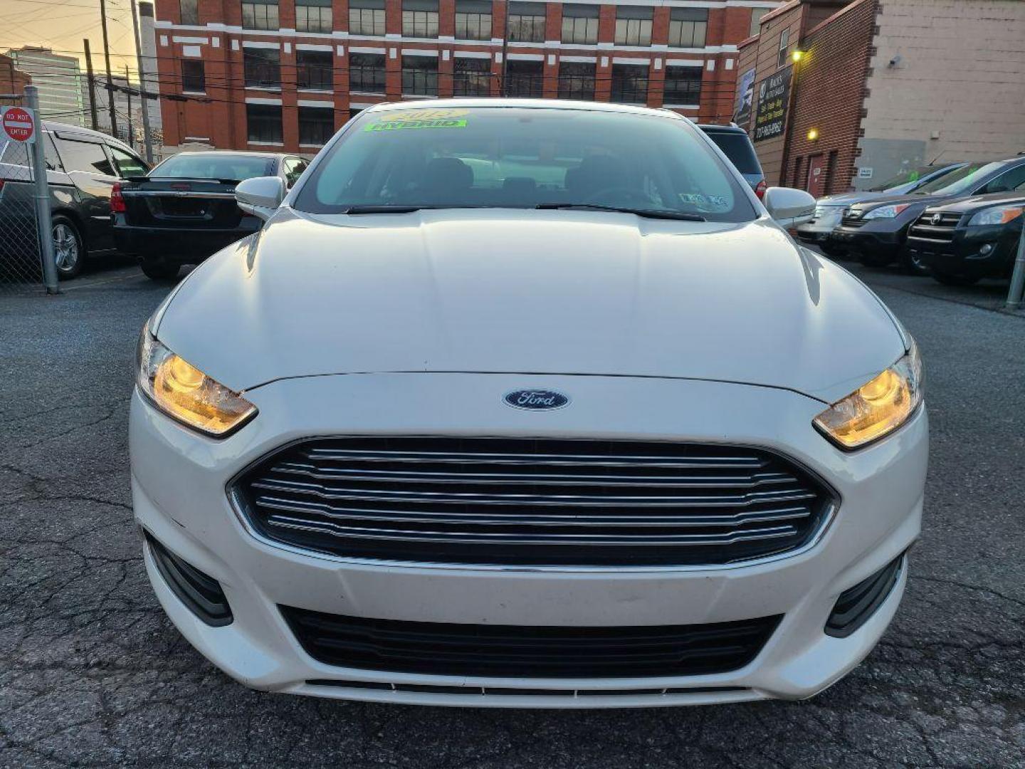 2013 WHITE FORD FUSION SE HYBRID (3FA6P0LUXDR) with an 2.0L engine, Continuously Variable transmission, located at 7981 Paxton Street, Harrisburg, PA, 17111, (717) 561-2926, 40.261490, -76.749229 - Photo#7