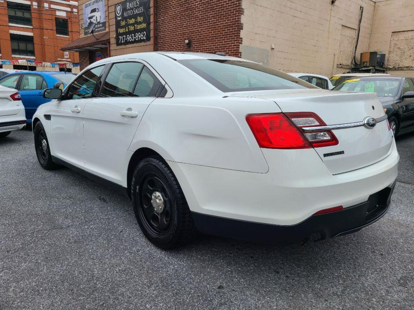 2013 WHITE FORD TAURUS POLICE INTERCEPTOR (1FAHP2MK8DG) with an 3.7L engine, Automatic transmission, located at 117 North Cameron Street, Harrisburg, PA, 17101, (717) 963-8962, 40.267021, -76.875351 - WE FINANCE!!! Good Credit/ Bad Credit/ No Credit - ALL Trade-Ins Welcomed!!! ***Guaranteed Credit Approval*** APPLY ONLINE or CALL us TODAY ;) Internet Prices and Marketplace Prices are SPECIAL discounted ***CASH DEALS*** Retail Prices are higher. Please call us to discuss your cash and finan - Photo#2