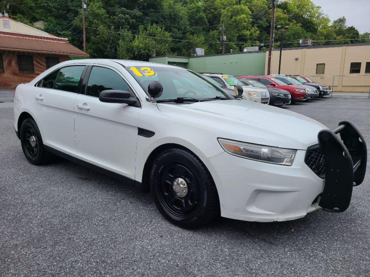 2013 WHITE FORD TAURUS POLICE INTERCEPTOR (1FAHP2MK8DG) with an 3.7L engine, Automatic transmission, located at 117 North Cameron Street, Harrisburg, PA, 17101, (717) 963-8962, 40.267021, -76.875351 - WE FINANCE!!! Good Credit/ Bad Credit/ No Credit - ALL Trade-Ins Welcomed!!! ***Guaranteed Credit Approval*** APPLY ONLINE or CALL us TODAY ;) Internet Prices and Marketplace Prices are SPECIAL discounted ***CASH DEALS*** Retail Prices are higher. Please call us to discuss your cash and finan - Photo#6