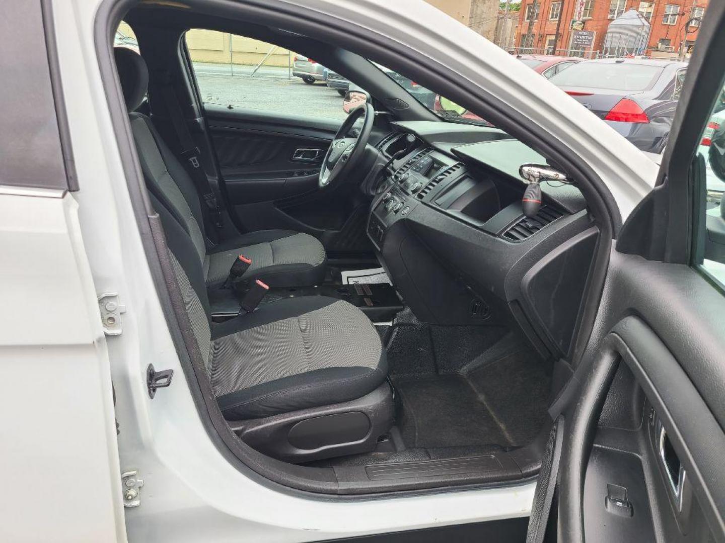 2013 WHITE FORD TAURUS POLICE INTERCEPTOR (1FAHP2MK8DG) with an 3.7L engine, Automatic transmission, located at 117 North Cameron Street, Harrisburg, PA, 17101, (717) 963-8962, 40.267021, -76.875351 - WE FINANCE!!! Good Credit/ Bad Credit/ No Credit - ALL Trade-Ins Welcomed!!! ***Guaranteed Credit Approval*** APPLY ONLINE or CALL us TODAY ;) Internet Prices and Marketplace Prices are SPECIAL discounted ***CASH DEALS*** Retail Prices are higher. Please call us to discuss your cash and finan - Photo#8