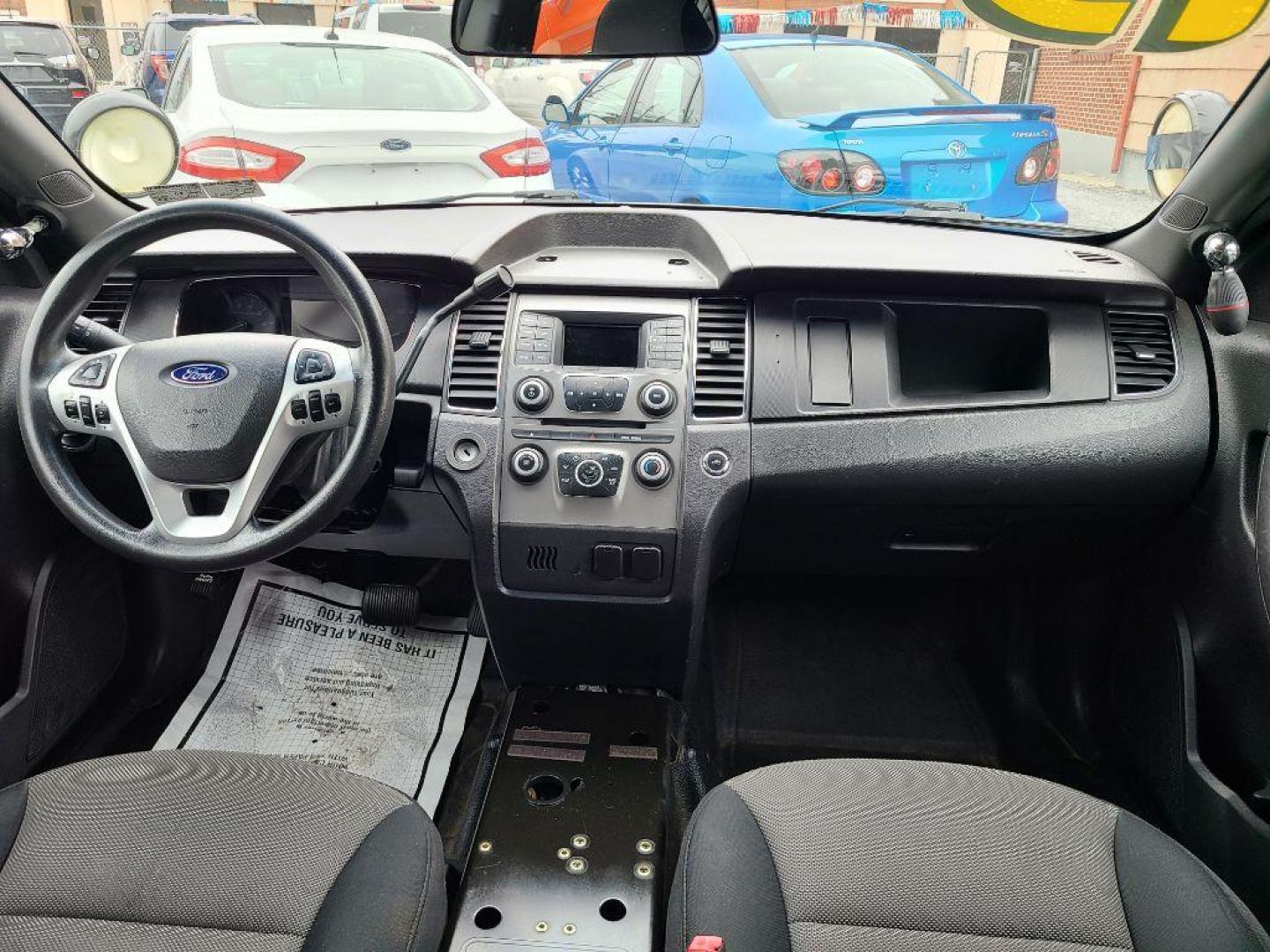 2013 WHITE FORD TAURUS POLICE INTERCEPTOR (1FAHP2MK8DG) with an 3.7L engine, Automatic transmission, located at 117 North Cameron Street, Harrisburg, PA, 17101, (717) 963-8962, 40.267021, -76.875351 - WE FINANCE!!! Good Credit/ Bad Credit/ No Credit - ALL Trade-Ins Welcomed!!! ***Guaranteed Credit Approval*** APPLY ONLINE or CALL us TODAY ;) Internet Prices and Marketplace Prices are SPECIAL discounted ***CASH DEALS*** Retail Prices are higher. Please call us to discuss your cash and finan - Photo#9