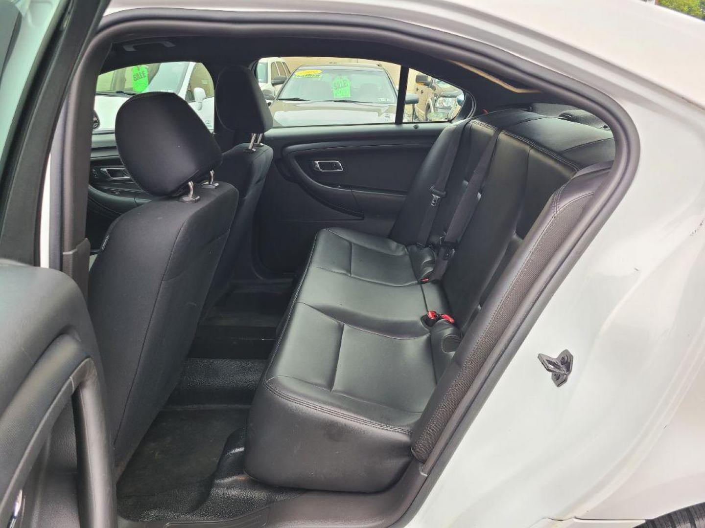 2013 WHITE FORD TAURUS POLICE INTERCEPTOR (1FAHP2MK8DG) with an 3.7L engine, Automatic transmission, located at 117 North Cameron Street, Harrisburg, PA, 17101, (717) 963-8962, 40.267021, -76.875351 - WE FINANCE!!! Good Credit/ Bad Credit/ No Credit - ALL Trade-Ins Welcomed!!! ***Guaranteed Credit Approval*** APPLY ONLINE or CALL us TODAY ;) Internet Prices and Marketplace Prices are SPECIAL discounted ***CASH DEALS*** Retail Prices are higher. Please call us to discuss your cash and finan - Photo#11