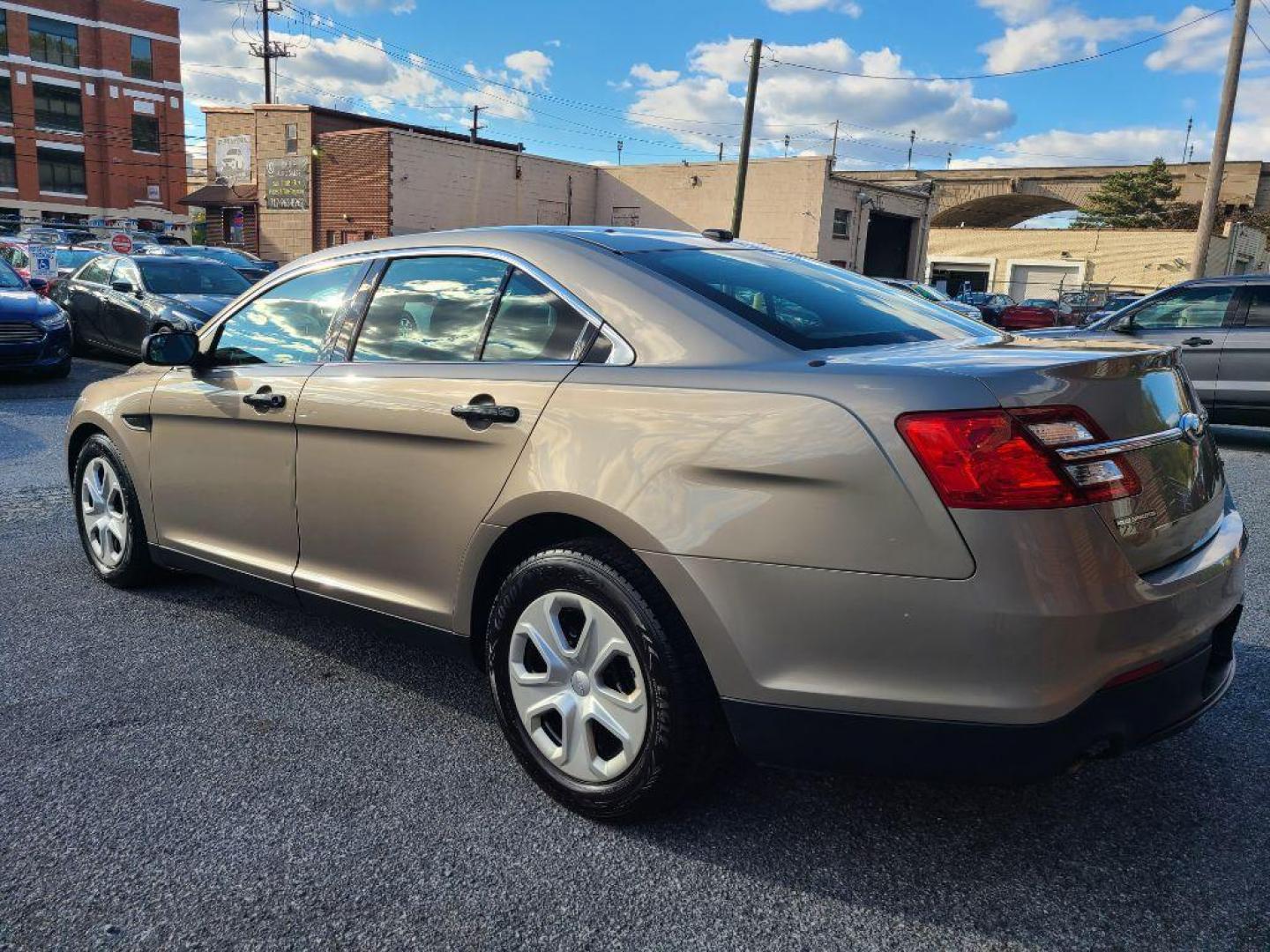 2013 GRAY FORD TAURUS POLICE INTERCEPTOR (1FAHP2M82DG) with an 3.5L engine, Automatic transmission, located at 117 North Cameron Street, Harrisburg, PA, 17101, (717) 963-8962, 40.267021, -76.875351 - WE FINANCE!!! Good Credit/ Bad Credit/ No Credit - ALL Trade-Ins Welcomed!!! ***Guaranteed Credit Approval*** APPLY ONLINE or CALL us TODAY ;) Please call us to discuss your cash and financing options. - Photo#2