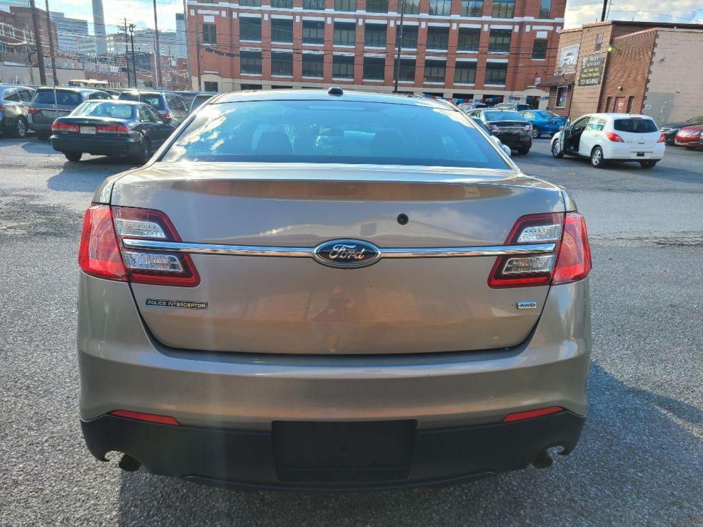 2013 GRAY FORD TAURUS POLICE INTERCEPTOR (1FAHP2M82DG) with an 3.5L engine, Automatic transmission, located at 117 North Cameron Street, Harrisburg, PA, 17101, (717) 963-8962, 40.267021, -76.875351 - WE FINANCE!!! Good Credit/ Bad Credit/ No Credit - ALL Trade-Ins Welcomed!!! ***Guaranteed Credit Approval*** APPLY ONLINE or CALL us TODAY ;) Please call us to discuss your cash and financing options. - Photo#3