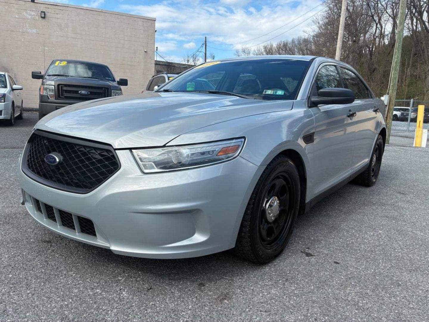 2013 SILVER FORD TAURUS POLICE INTERCEPTOR (1FAHP2MK3DG) with an 3.7L engine, Automatic transmission, located at 117 North Cameron Street, Harrisburg, PA, 17101, (717) 963-8962, 40.267021, -76.875351 - Photo#0