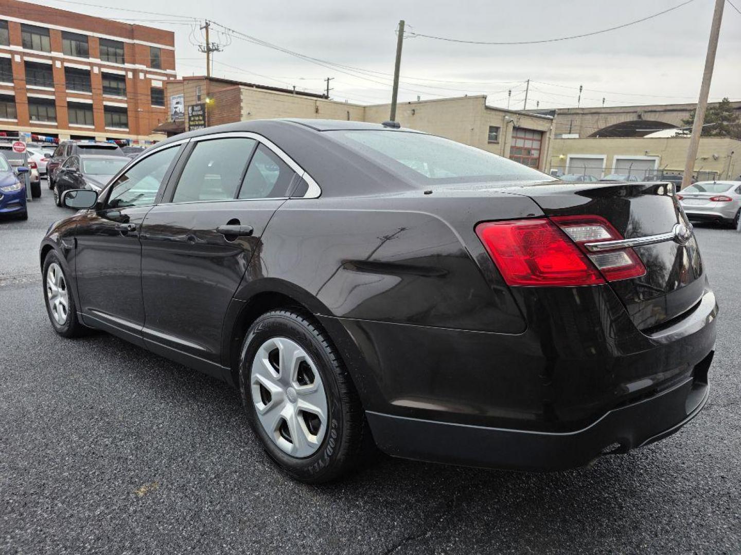 2013 BROWN FORD TAURUS POLICE INTERCEPTOR (1FAHP2MKXDG) with an 3.7L engine, Automatic transmission, located at 117 North Cameron Street, Harrisburg, PA, 17101, (717) 963-8962, 40.267021, -76.875351 - WE FINANCE!!! Good Credit/ Bad Credit/ No Credit - ALL Trade-Ins Welcomed!!! ***Guaranteed Credit Approval*** APPLY ONLINE or CALL us TODAY ;) Please call us to discuss your cash and financing options. - Photo#2